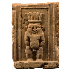 Ancient Egypt Stele with the image of the god Bes in limestone