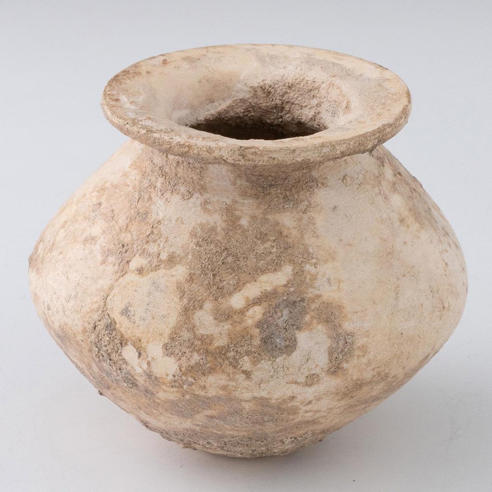 Material: Stone such as alabaster

Period: Ancient Egypt’s 12th dynasty

Date: 1887-1750BC

Origin: Ancient Egypt. North Africa

Condition: Fine, surface encrustations

Description: A stone vessel with globular body, tapering neck to a small flat