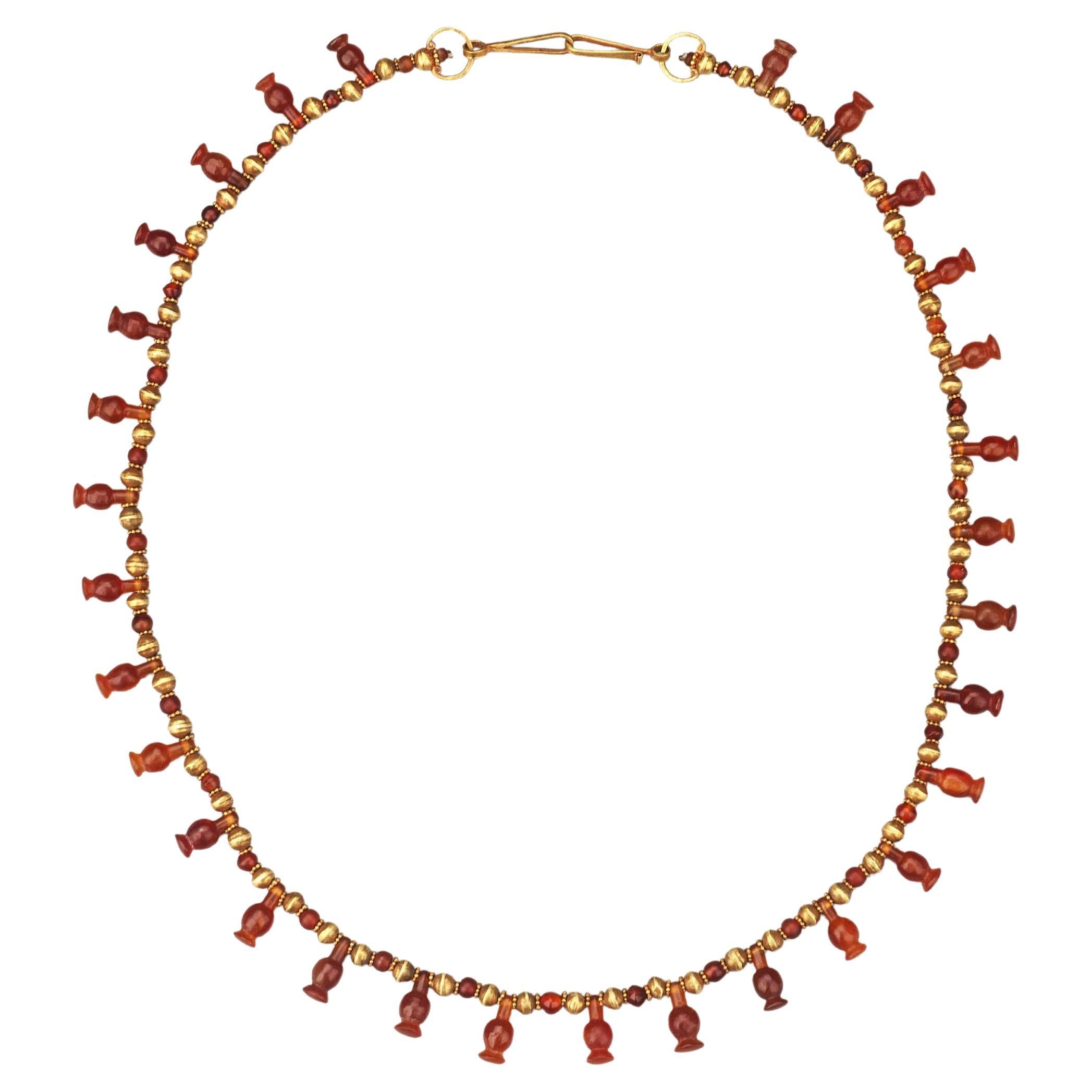 Ancient Egyptian Carnelian Poppy Seed Pod Pendant Necklace with 20k Gold Beads For Sale
