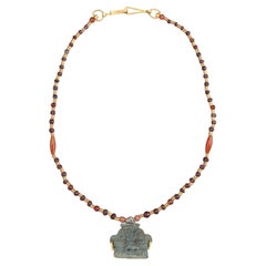 Ancient Egyptian Faience Bes Amulet Pendant with Garnet, Carnelian, 20k Gold