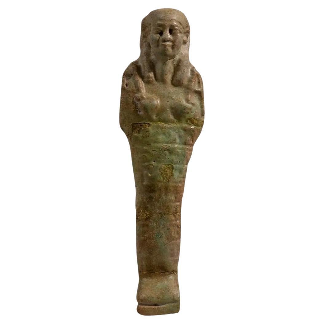 Figura di Ushabti in faience dell'Antico Egitto, 700-30 a.C. circa. in vendita