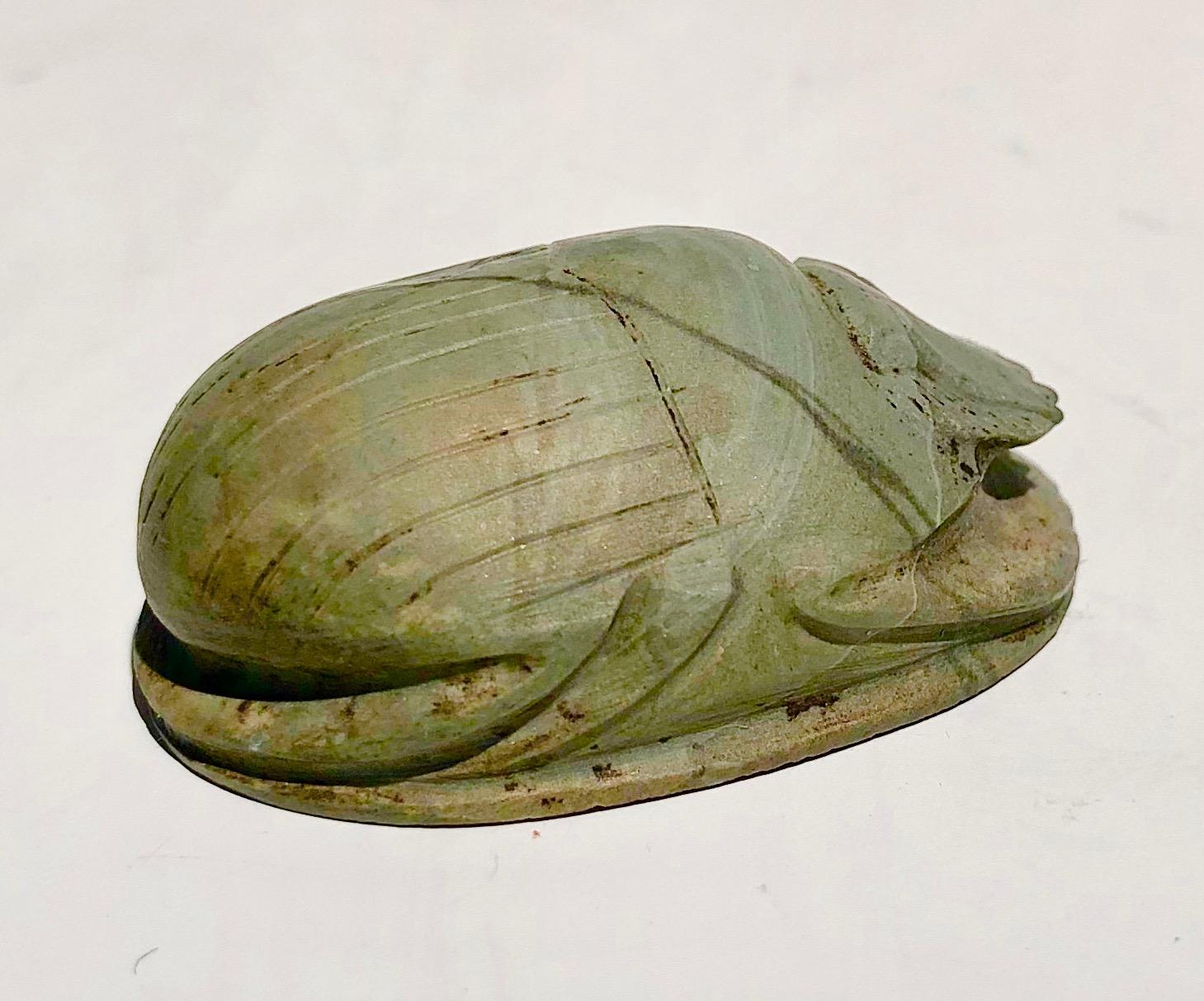 Delicately carved heart scarab. Greenish stone with fine veins. Egypt, late period, 664-332 BC. Provenance: German collection of Mr. E. S., Nr. 741; previously collection of Prof. Dr. C. Haebrlin, Wyk/Föhr. Imported by missionaries in the 19th