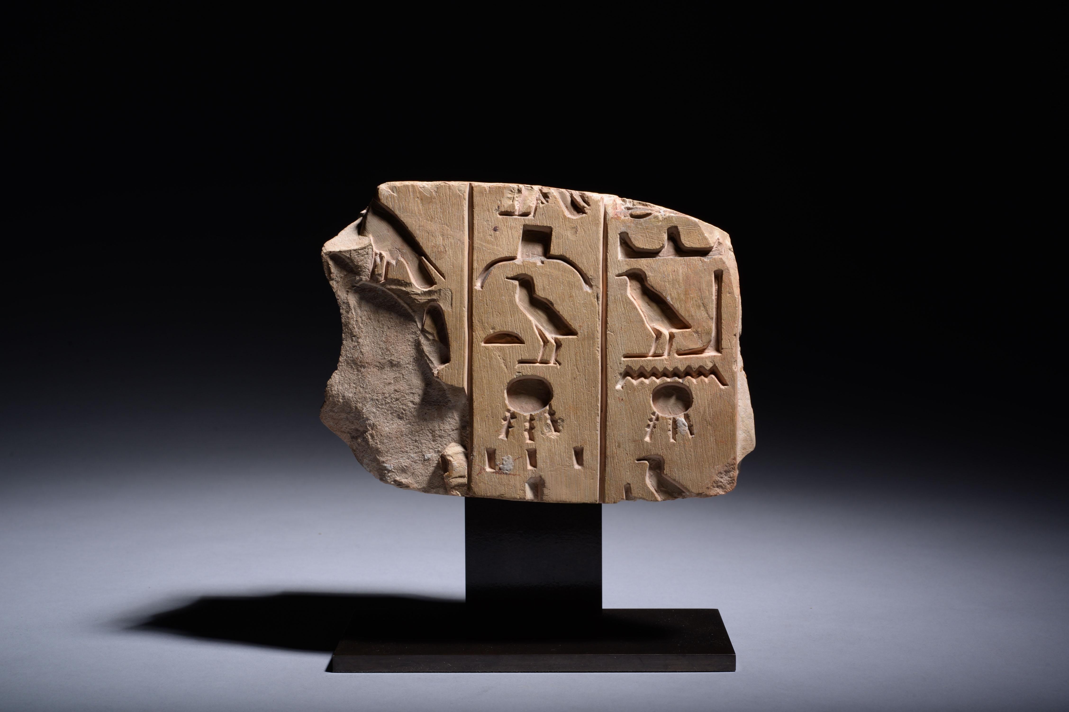 Egyptian New Kingdom Relief Fragment
Carved limestone
New Kingdom, circa 1550-1069 BC
12 x 16.5 cm

This beautiful fragment preserves three columns of neat hieroglyphs deeply carved in limestone; each column separated from the other by an incised