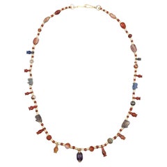 Ancient Egyptian New Kingdom Amulets of Various Stones with 20k Gold Tube Beads
