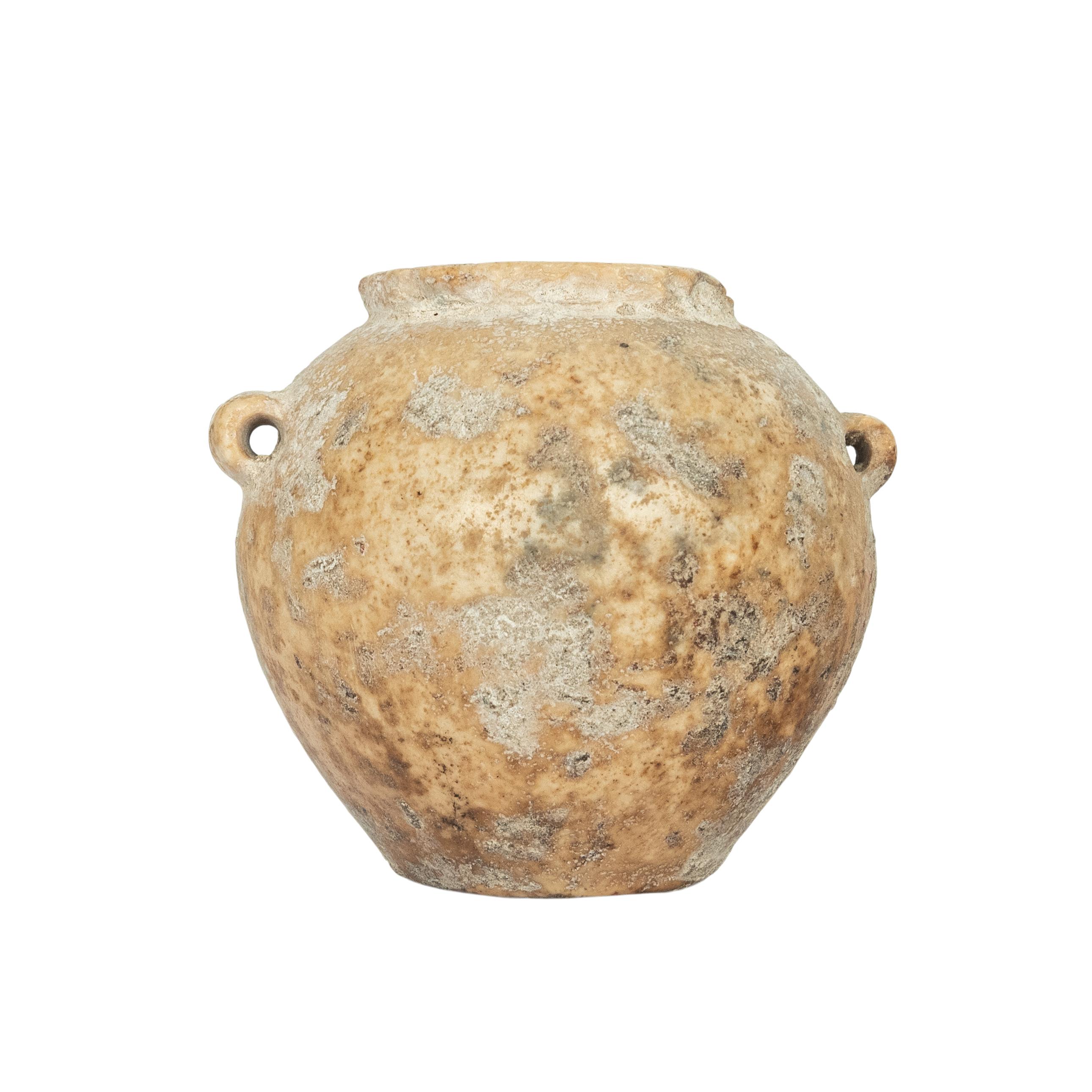 An ancient Egyptian stone vessel/jar, Old Kingdom, 2600-2800 BCE.
This is an original lime stone jar from the time of the pyramid builders, these vessels where hand carved with the use of sand and sometimes rudimentary drills. The squat ovoid vessel