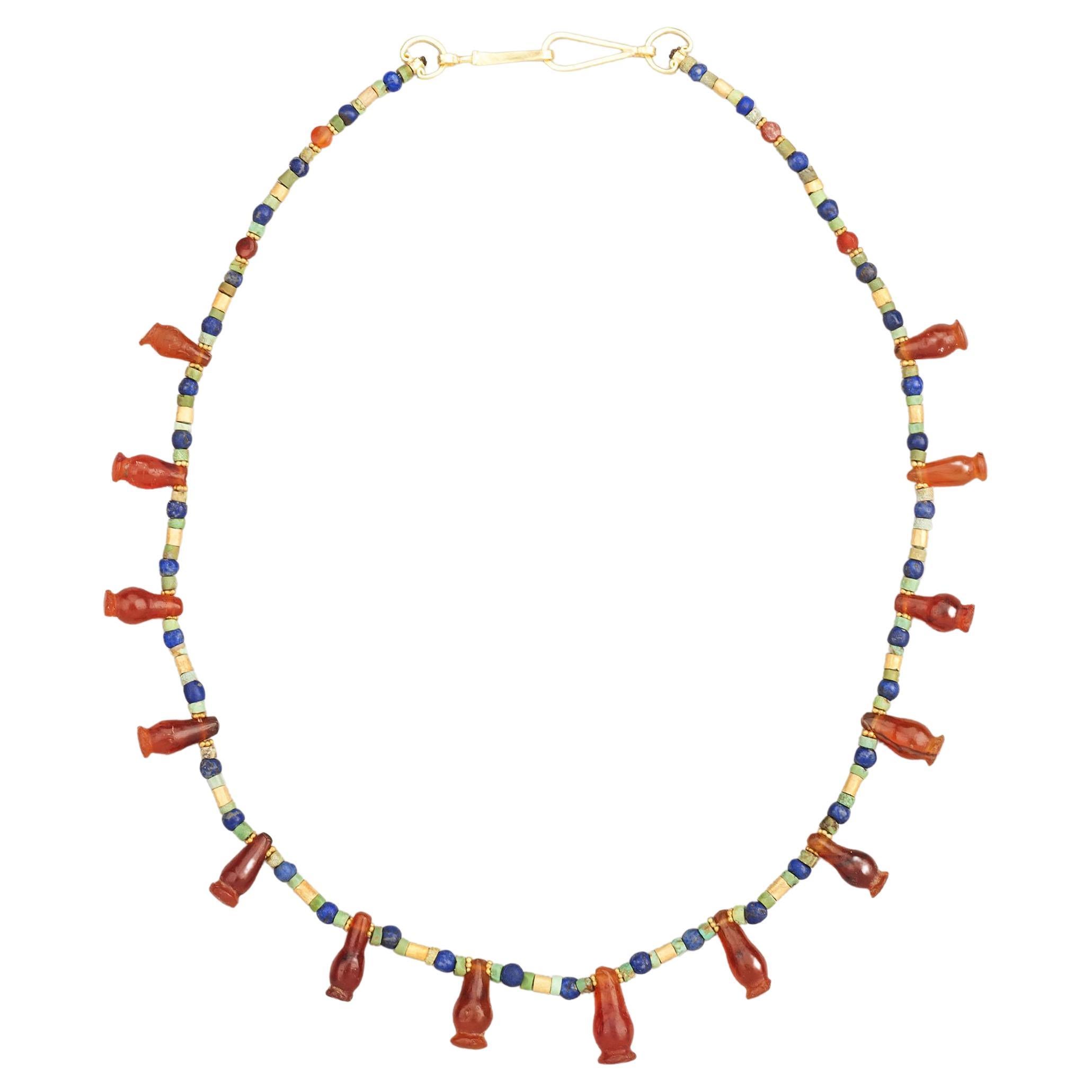 Ancient Egyptian Poppy Seed Pod Pendants with Gold, Lapis Lazuli, and Turquoise For Sale