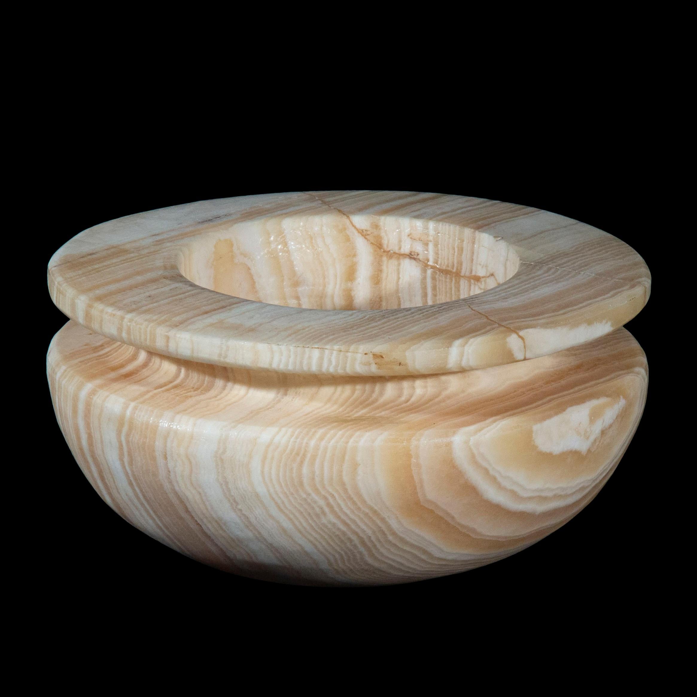 An interesting Egyptian alabaster vessel,
Possibly 19th century in the style of Old Kingdom (2686-2160 BC).

Why we like it
The large size, smart shape and dramatic veining make this unusual vessel very decorative and suited for a variety of