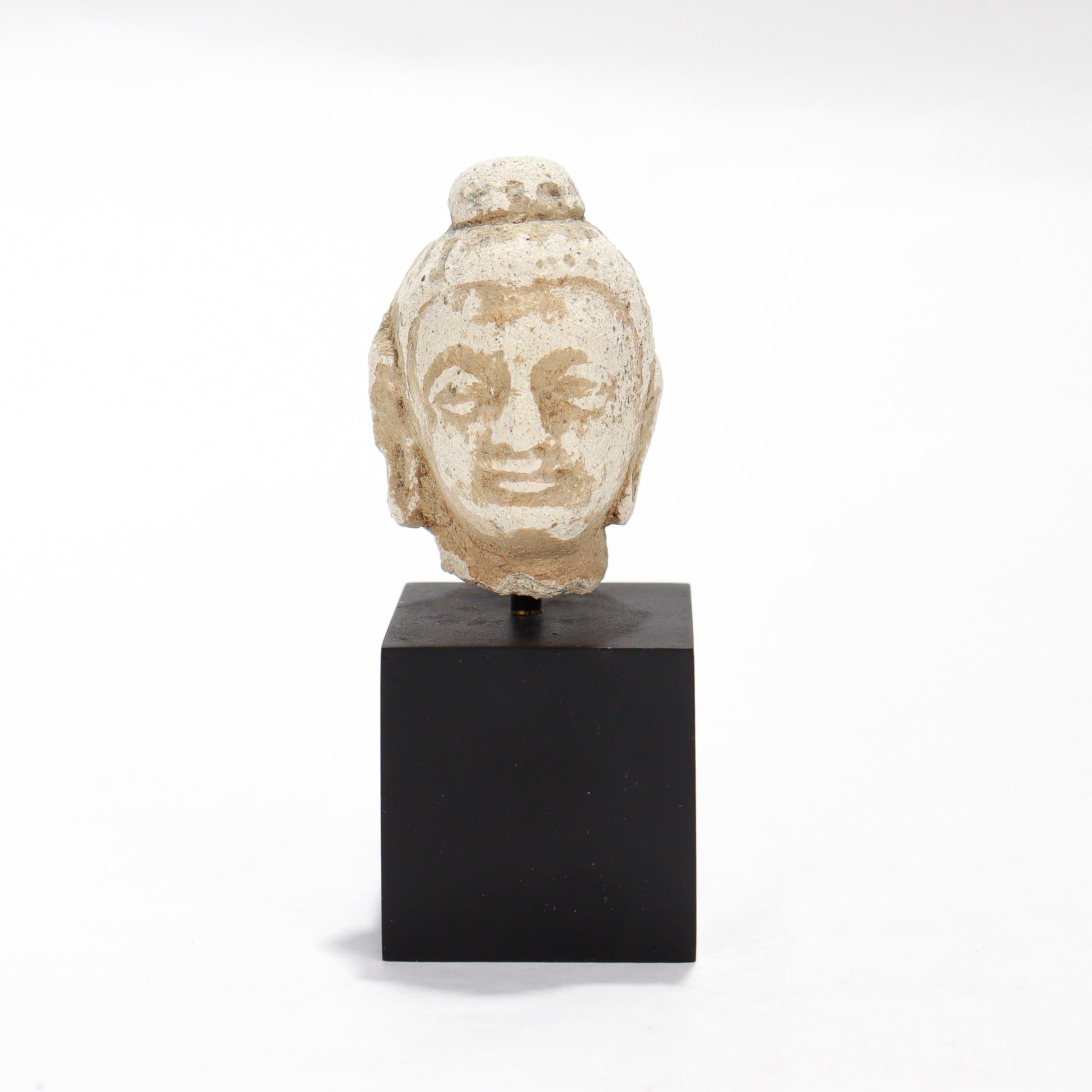 Ancient Gandharan Stucco Small Bust of the Buddha or Bodhisattva In Fair Condition For Sale In Philadelphia, PA
