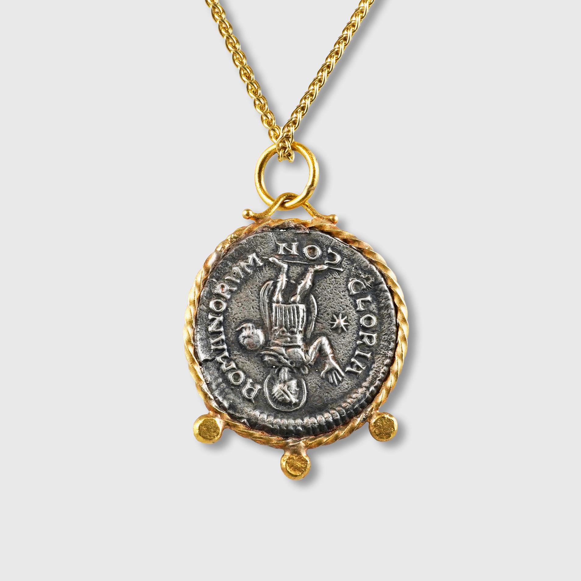 Gold-Framed Ancient Gloria Romanorum (Glory of the Romans), Tetradrachm Coin (Replica) Charm Pendant, 24kt Gold, Silver & 0.06ct Diamonds

Sterling Silver coin is a replica coin from those in the Turkish Museum.

Diamonds - 0.06ct
24kt Gold - 1.91