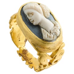 Ancient Gold Ring Set with a Sardonyx Cameo of a Woman. Roman, 3rd century AD.
