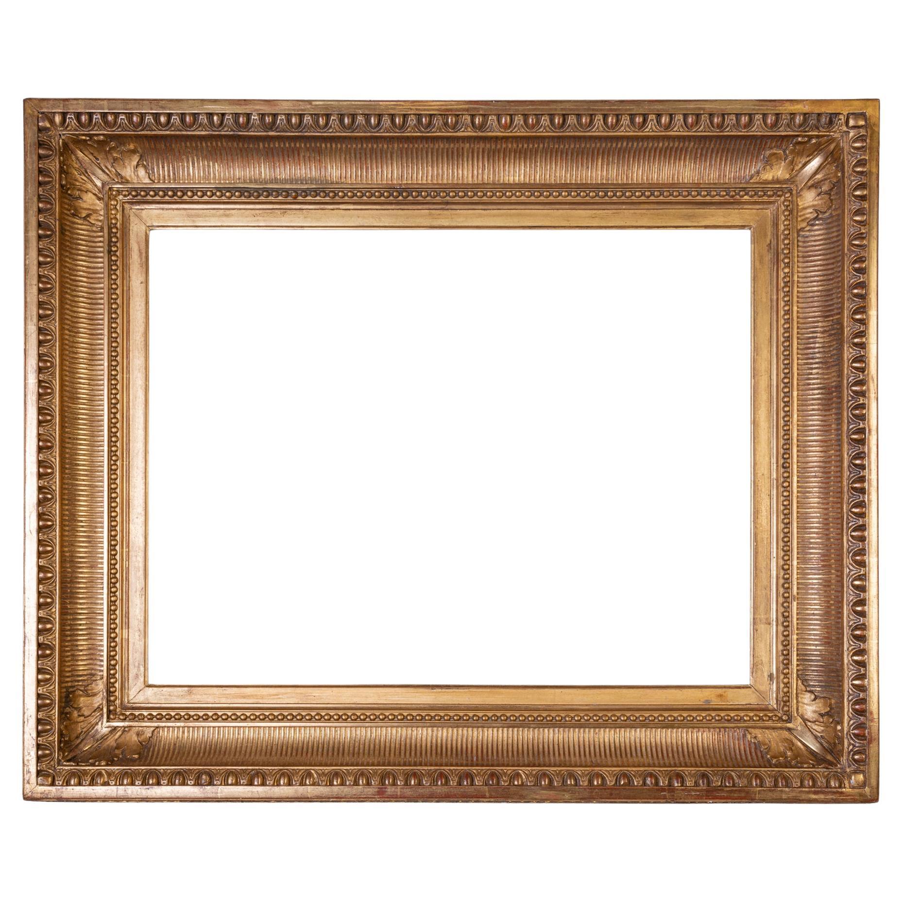 Cadre en bois doré ancien, également pour miroir en vente