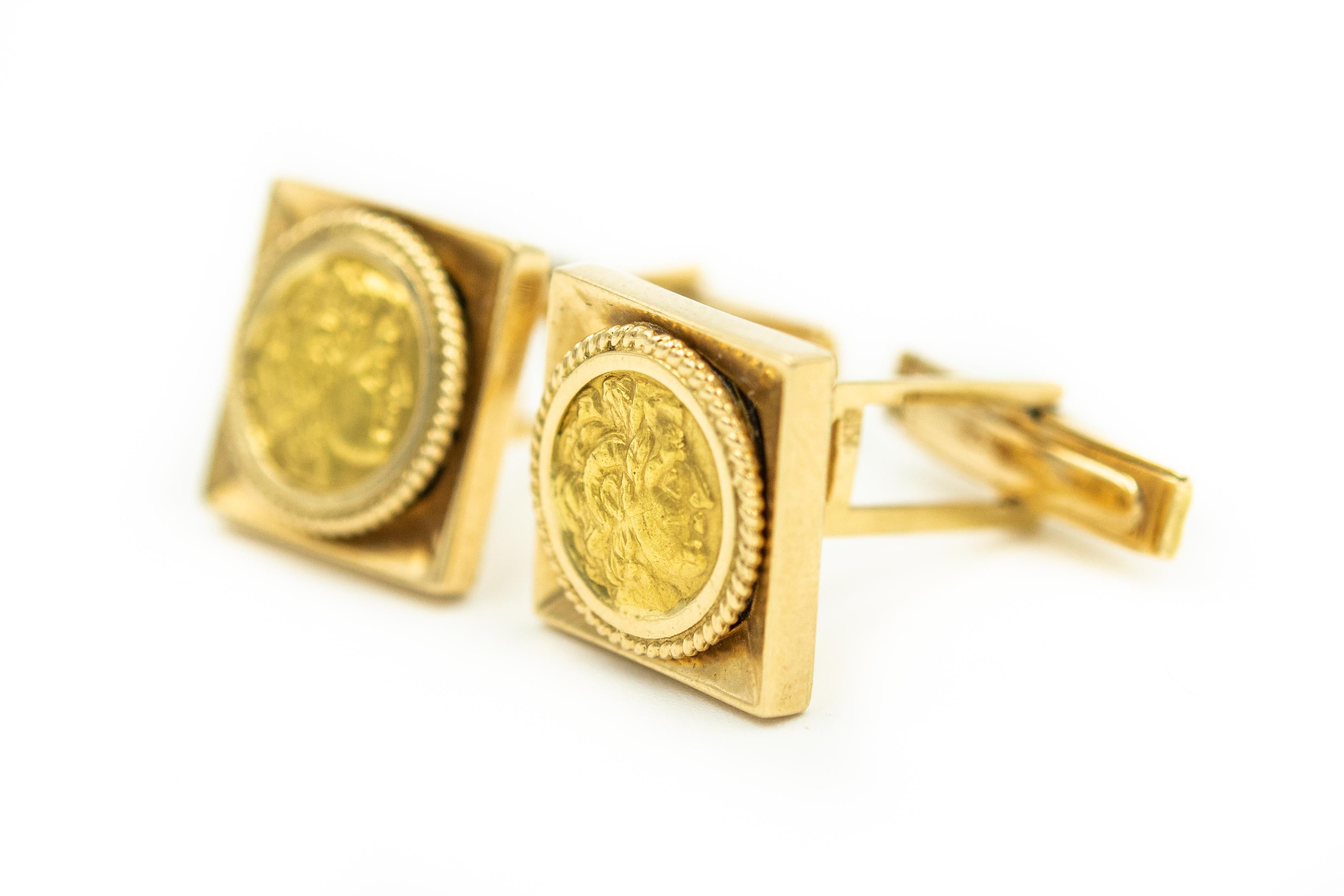 Elegant 18k yellow gold square cufflinks featuring a raised profile portrait of an ancient Grecian or Roman man.  The backs are whale back t-bars so it’s very easy to put them on.

Marked A.61 and K18

