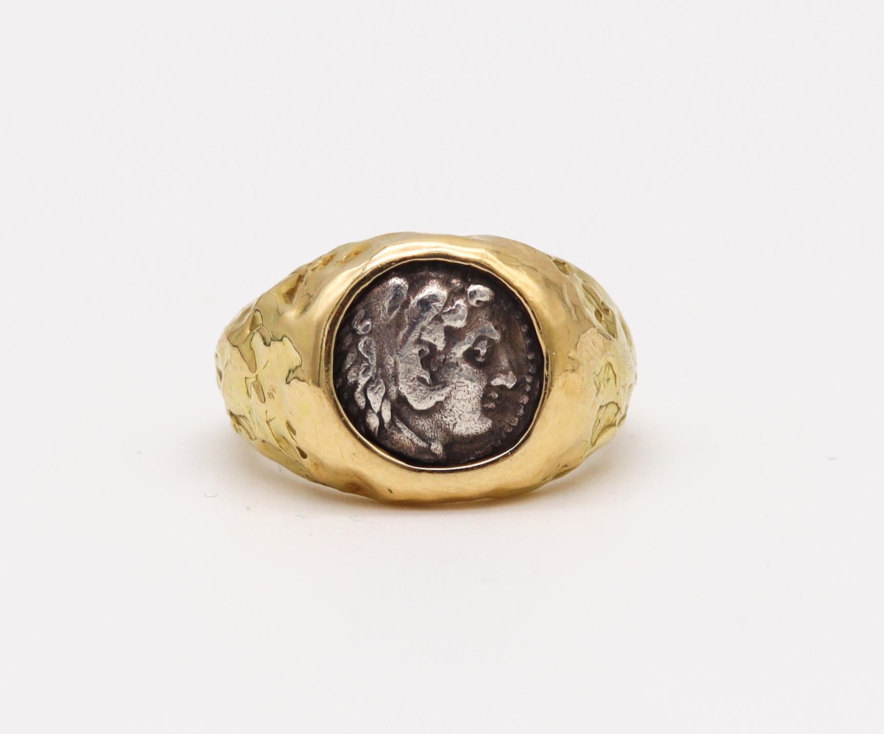 A ring with an ancient Greek coin.

Beautiful signet ring mounted in a bezel with an authentic coin from the ancient Greece world. This ring has been crafted as a one of a kind piece in solid yellow gold of 18 karats with hammered textured finish.