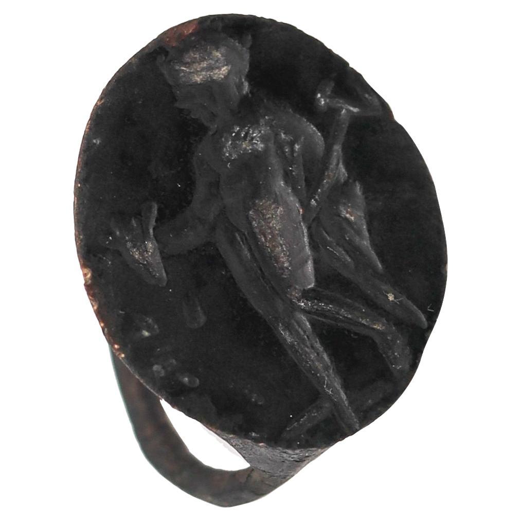 Ancient Greece 4th Century BC Hephaestus Signet Bronze Ring with Hermes For Sale