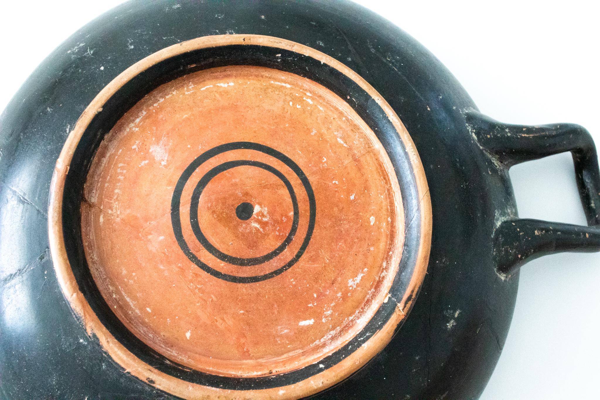 A Ancient Greek Kylix vase.

Campanian ancient Greek red terracotta stemless kylix (drinking cup) with two handles. from the Magna Grecia period. Made between the 350-300 BC in the Greek colonies of the southern italic peninsula, at Campania.