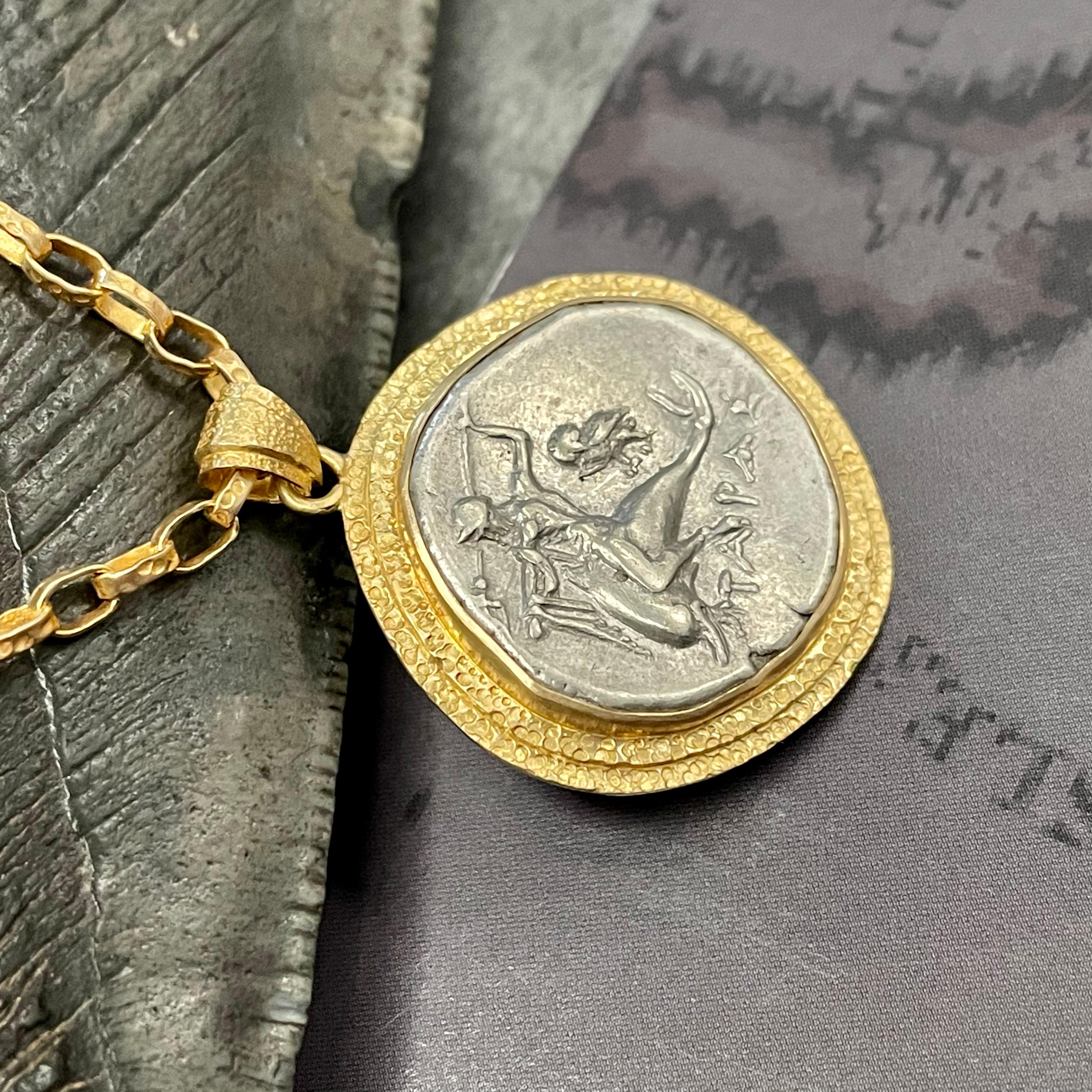 ancient greek dolphin coin