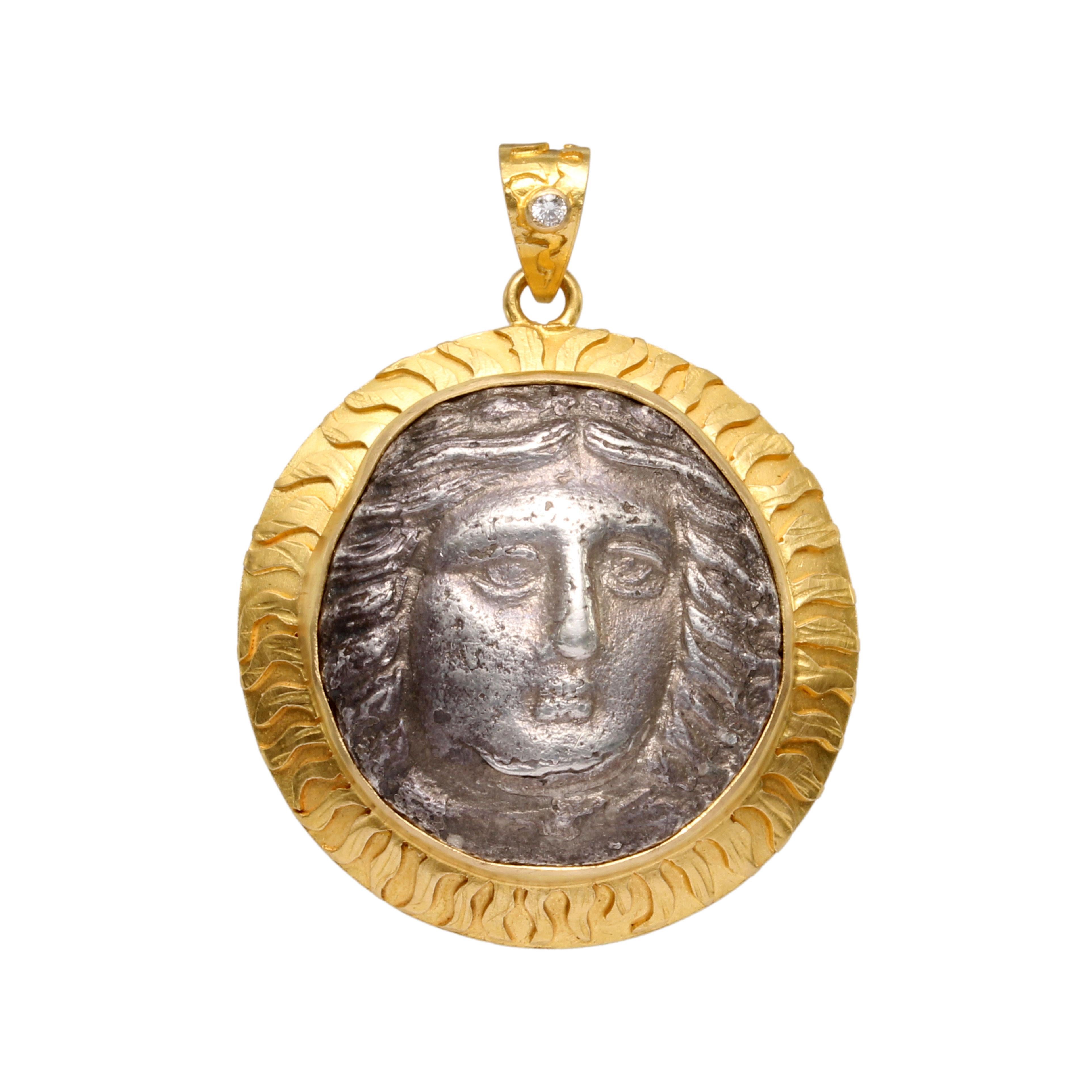 The Greek god Apollo is here depicted on an authentic silver 
