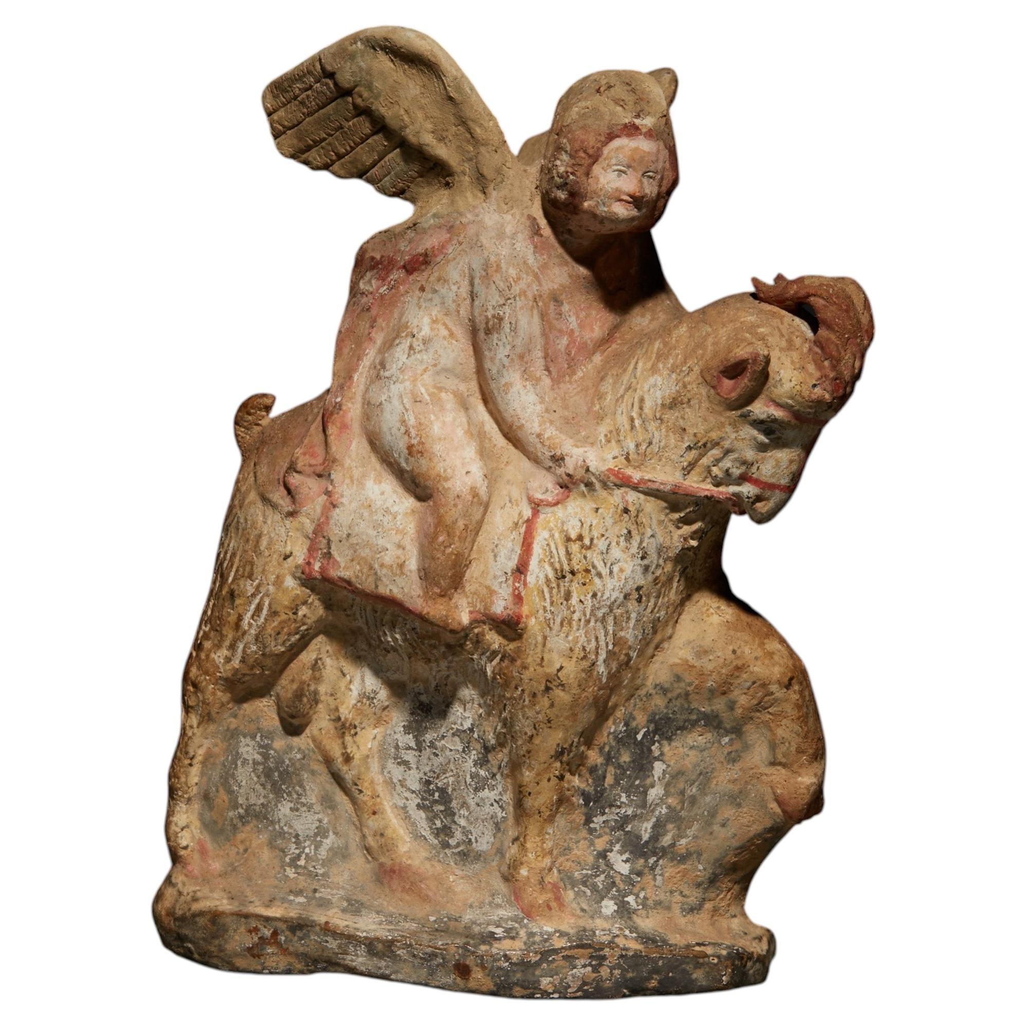 Ancient Greek Eros riding a goat in terracotta For Sale