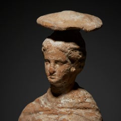 Ancient Greek Female sculpture in terracotta