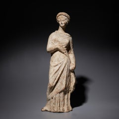 Ancient Greek Peplophore figure in terracotta