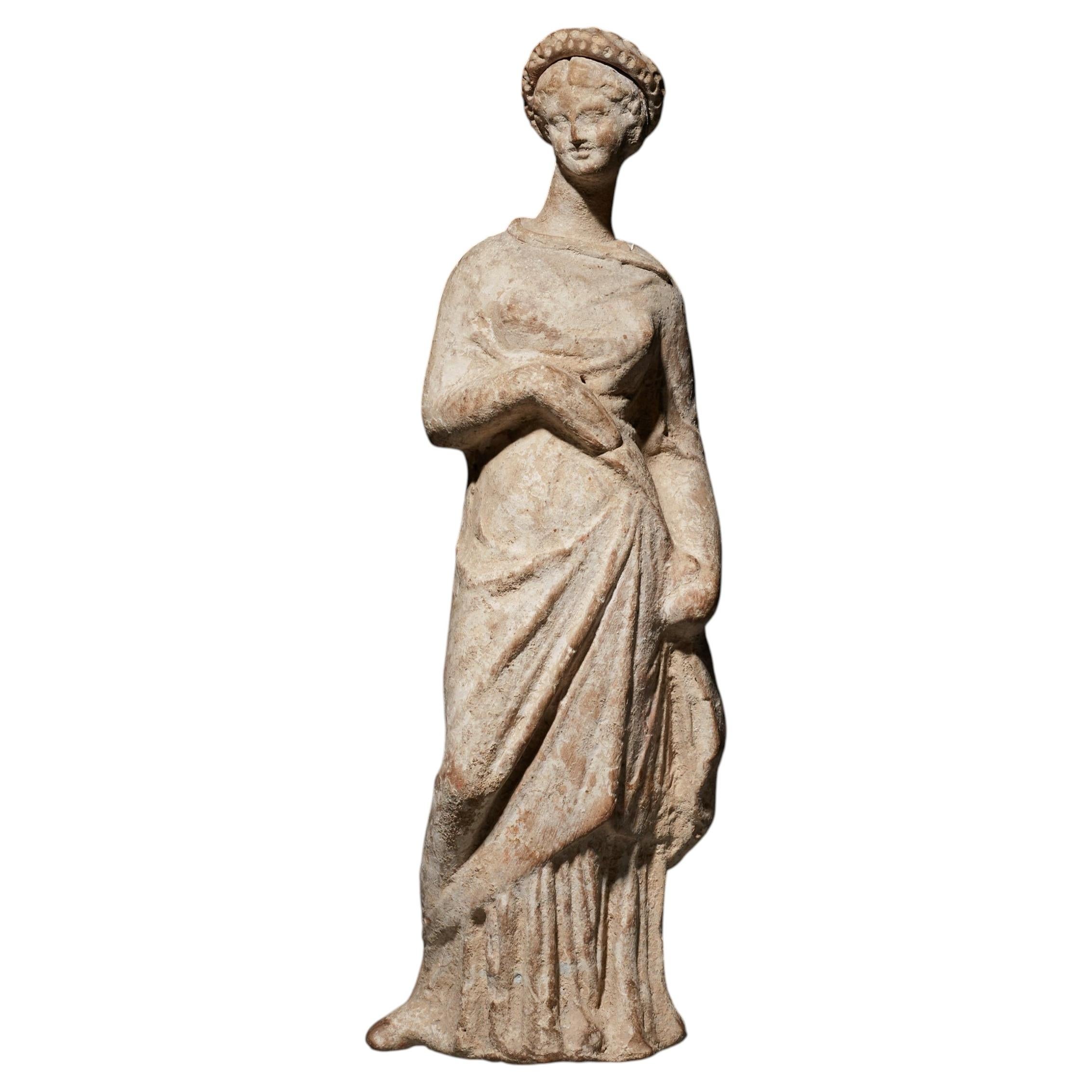 Ancient Greek Peplophore figure in terracotta