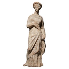 Ancient Greek Peplophore figure in terracotta