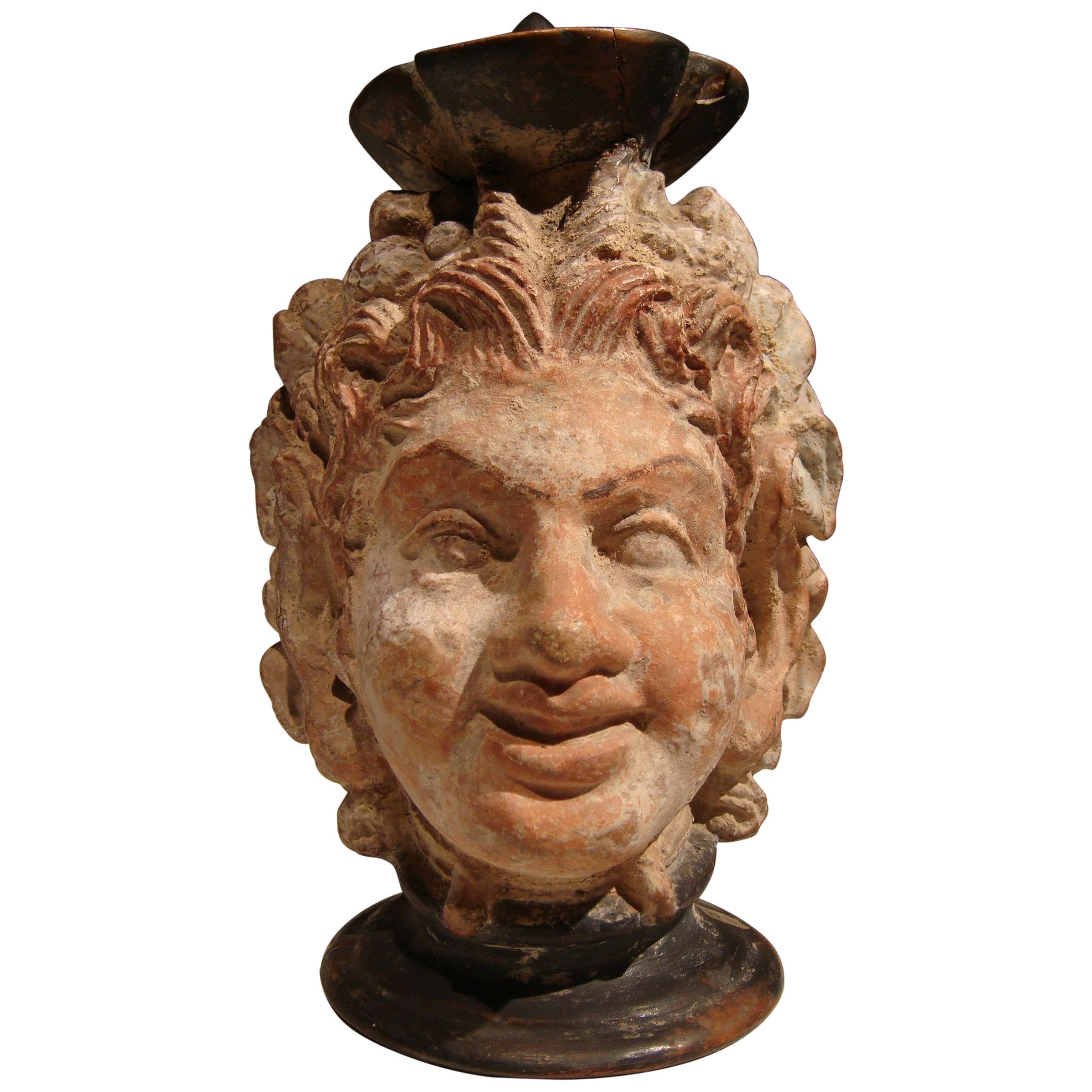 Ancient Greek Polychrome Head Vase with Face of a Faun For Sale