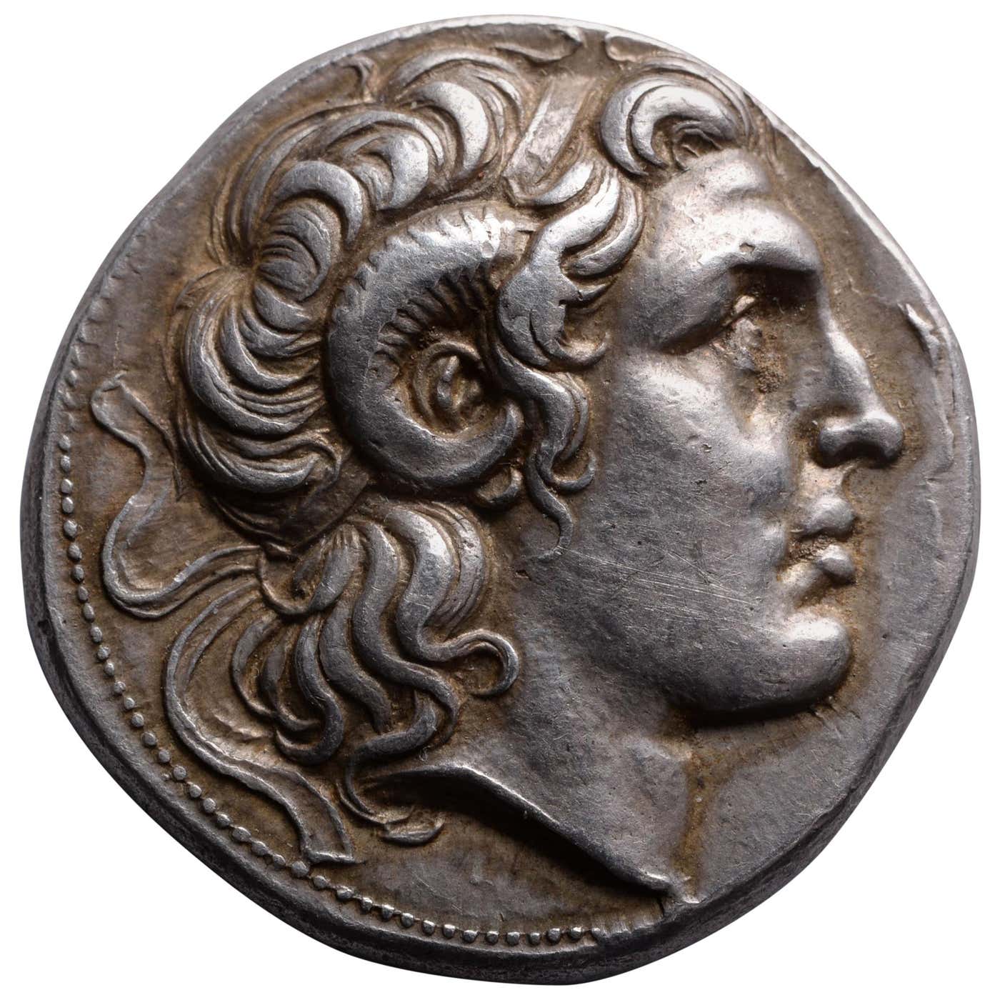 Ancient Greek Silver Tetradrachm Coin With The Portrait Of Alexander ancient-greek-silver-tetradrachm-coin-with-the-portrait-of-alexander
