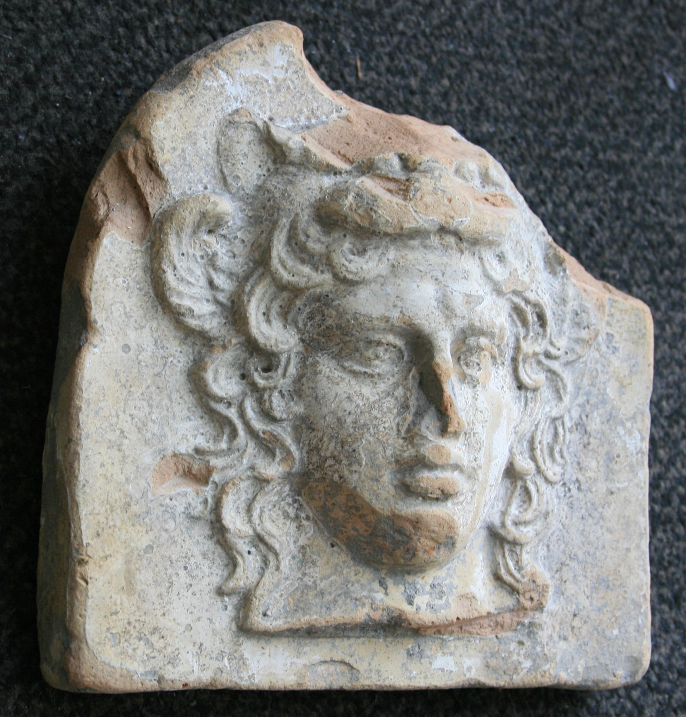 Classical Greek Ancient Greek Terracotta Antefix in Form of the Head of Artemis Bendis, Taranto For Sale