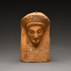 Protoma femenino de terracota de la antigua Grecia