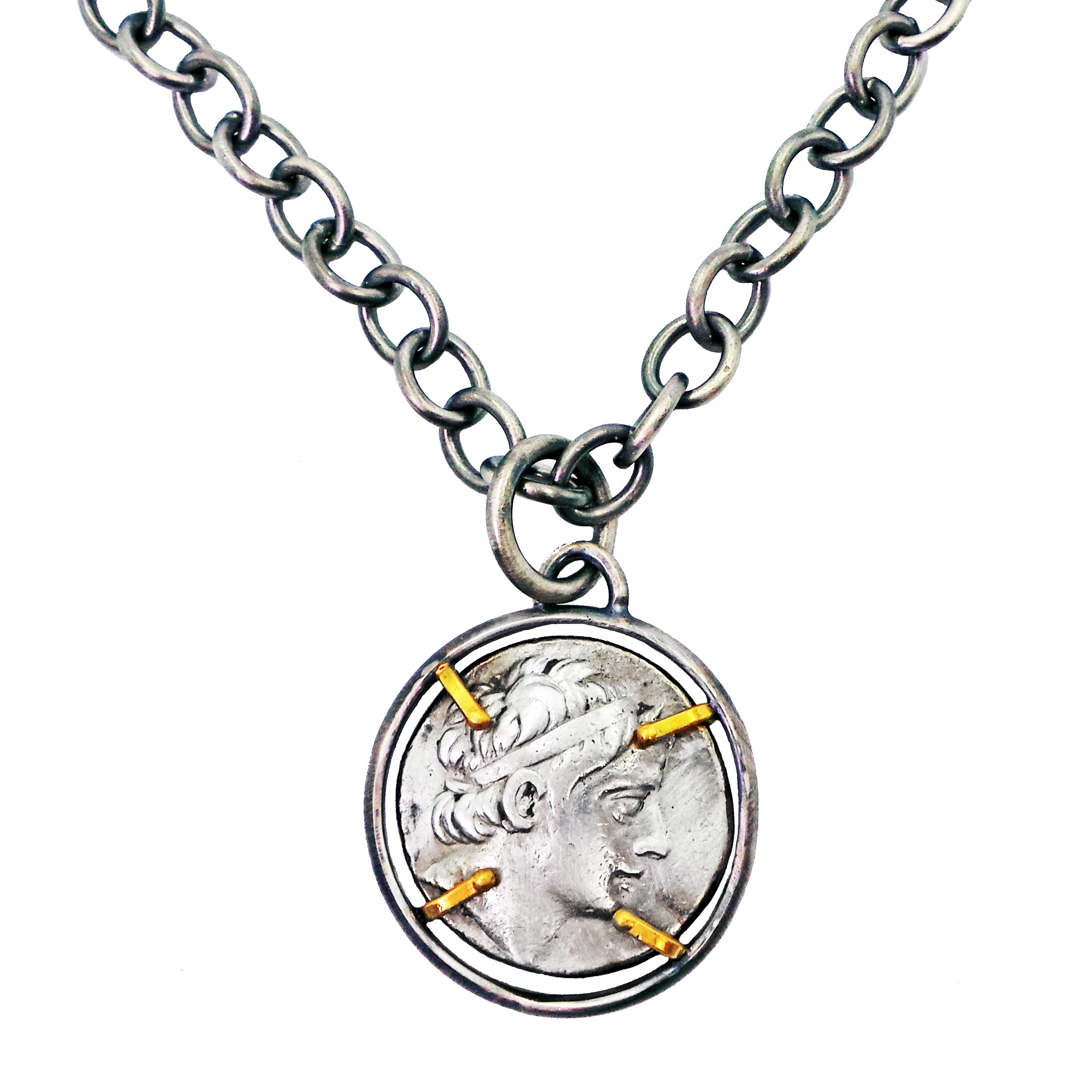 Authentic ancient Greek Tetradrachm (Antiochus III, Seleucid; 223-187 BC) silver coin set in a hand-forged sterling silver reversible pendant with 22k gold accent prongs. Pendant is on a 24 inch oxidized solid sterling silver cable chain necklace
