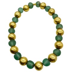 Collier ancien de perles en verre vert et or jaune