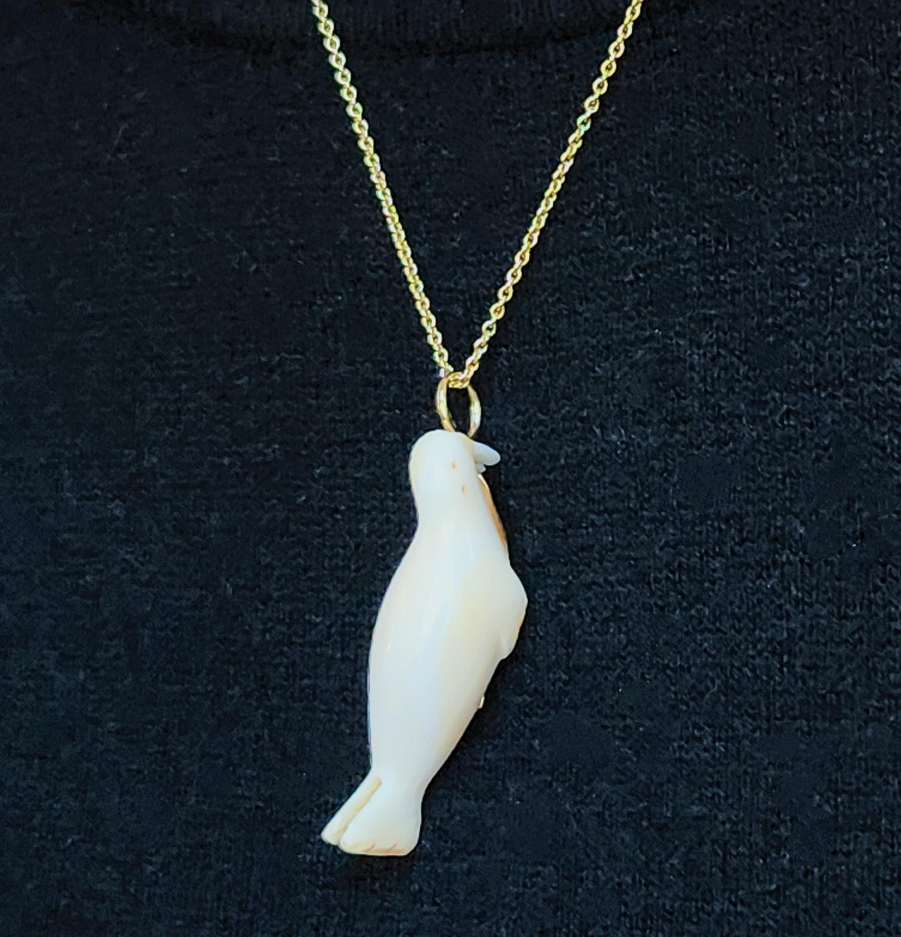 Vintage likely Inuit hand carving of a walrus one of a kind necklace in 18K. Natural simplicity designed pendant necklace that cherishes indigenous people who protect the earth and this small collection is an homage to the North American Inuits that