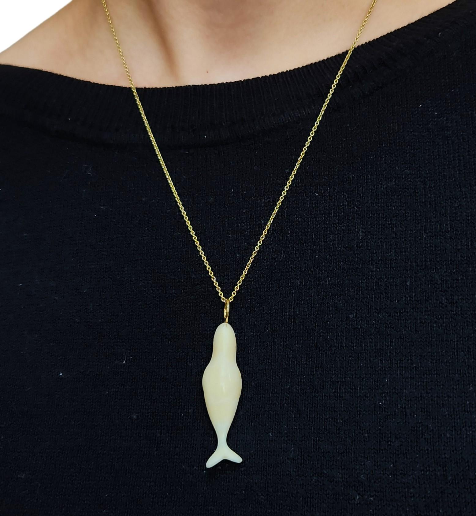 Vintage likely Inuit hand carving of a whale one of a kind necklace in 18K. Natural simply designed pendant necklace that cherishes indigenous people who protect the earth and this small collection is an homage to the North American Inuits that I