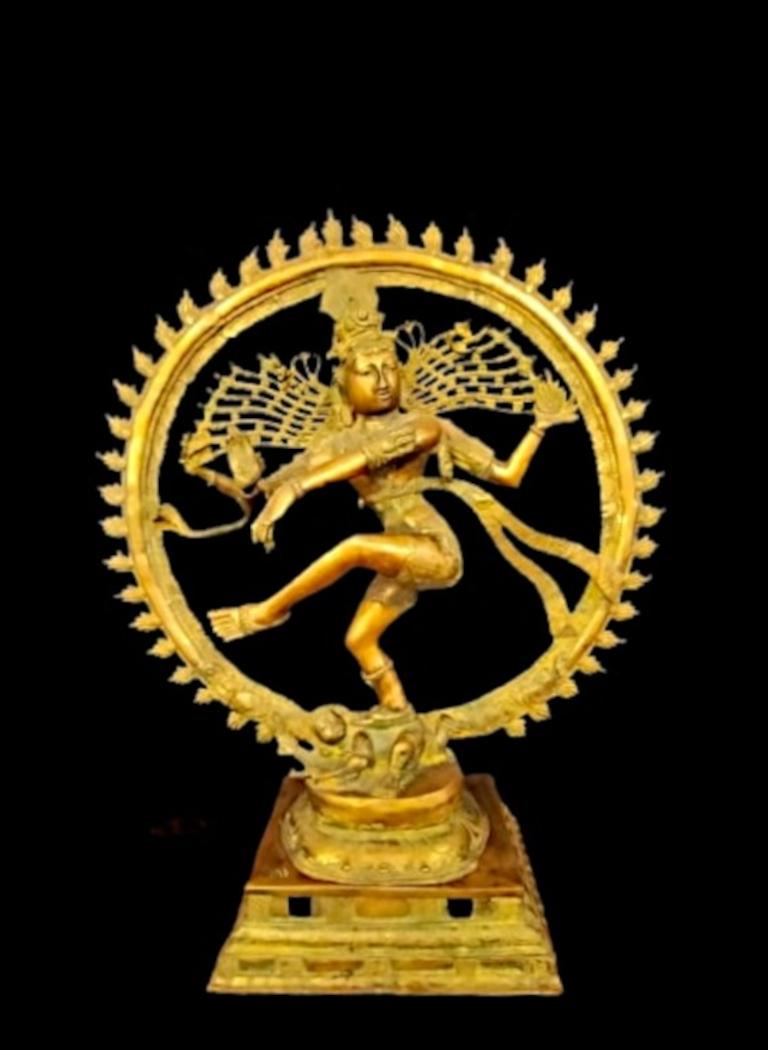 Ancient Indian solid brass sculpture - God Shiva dancing in the circle of fire, from the 1800s.

Dancing Shiva in the Circle of Fire
Brass statue of Shiva in the circle of fire
Ancient Indian brass statue, representing the deity Shiva dancing in the
