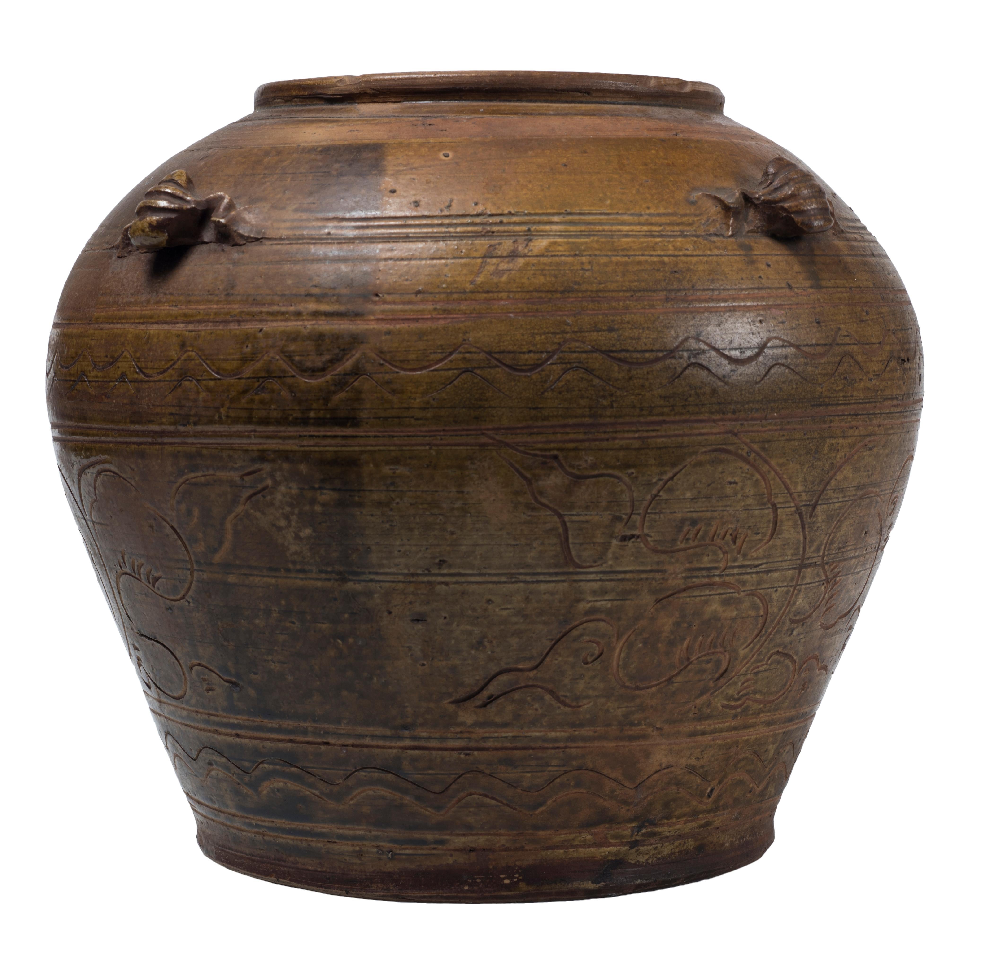Vintage jar is an original large terracotta jar by oriental manufacture and realized at the end of 18th century.

Includes 4 small insect-shaped handles. The surface is engraved and decorated with naturalistic motifs. 

This object is shipped
