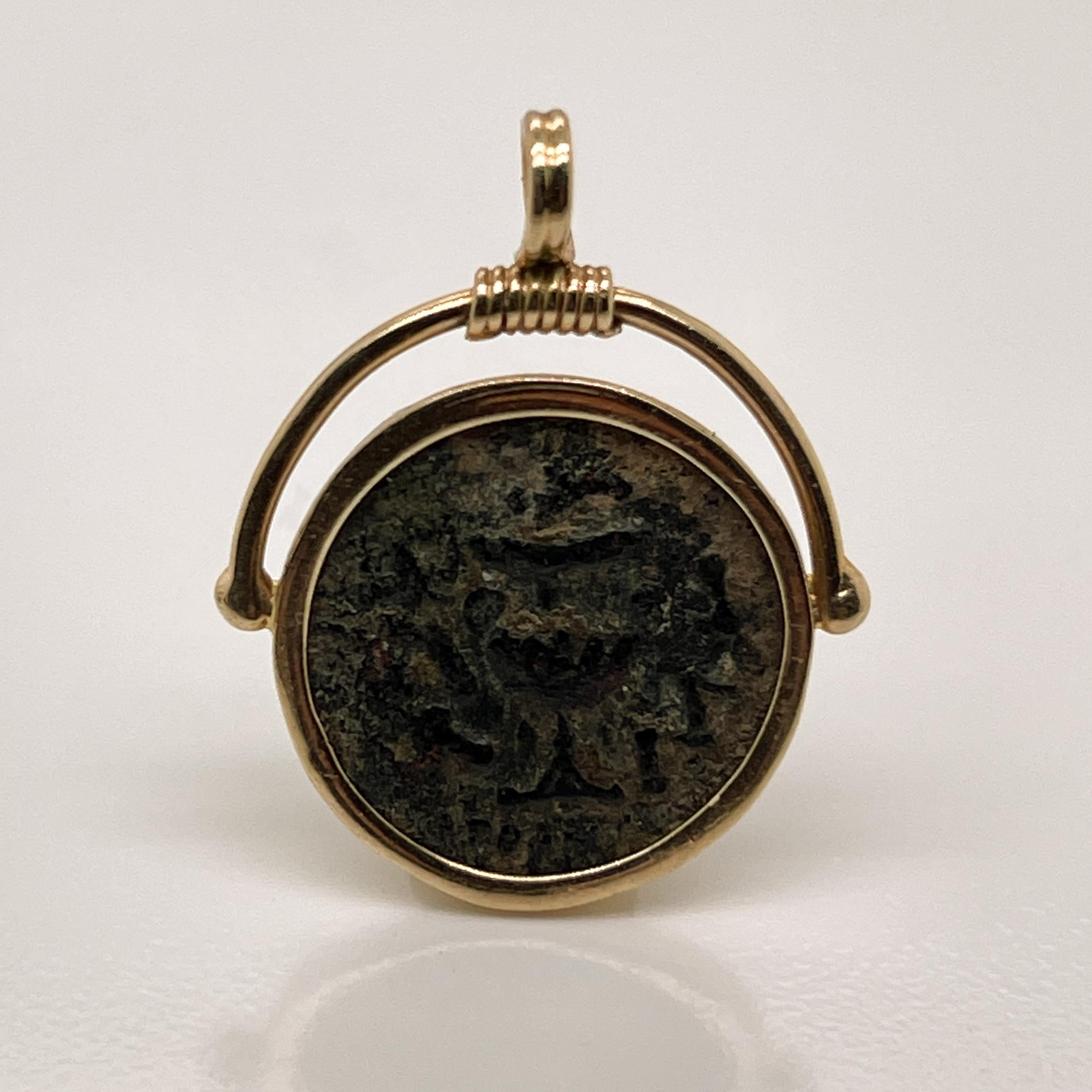 A fine ancient Jewish coin set as a pendant for a necklace.

The coin dates to the First Jewish-Roman War 