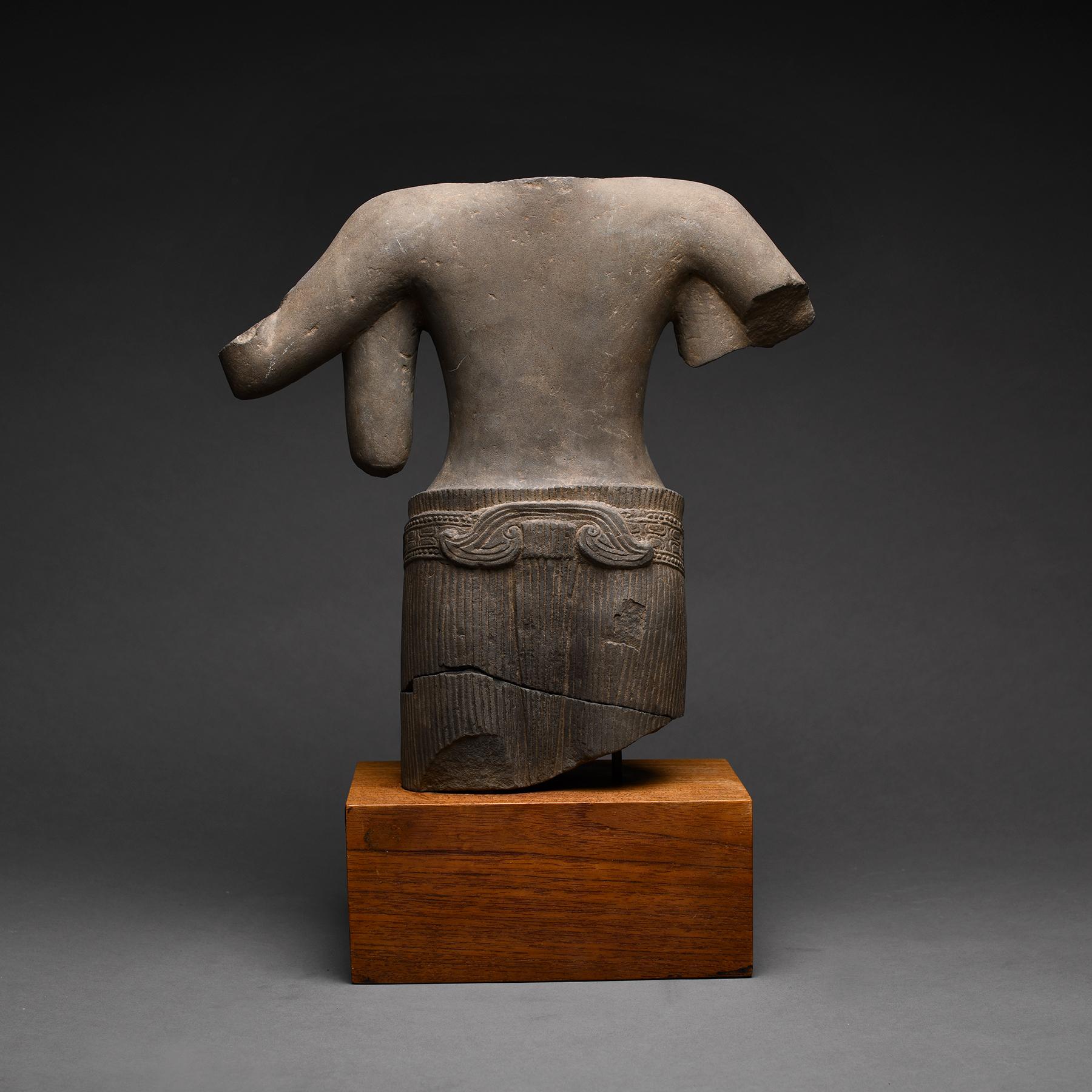 Ancient Khmer Sandstone Torso of a Four Armed Deity In Excellent Condition For Sale In Los Angeles, CA
