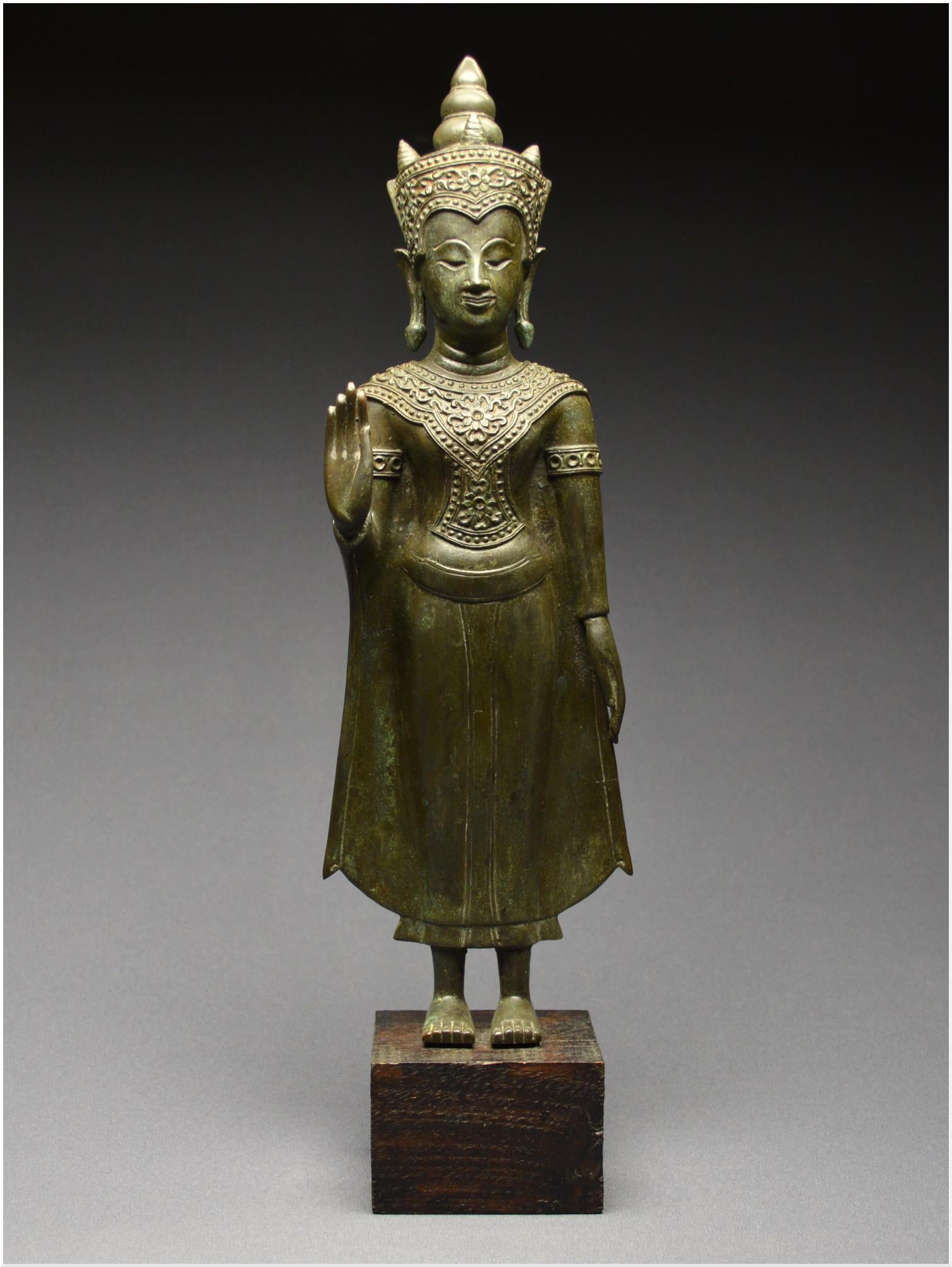 Bronze Buddha in the position of absence of fear

Ancient Kingdom of Siam
19th century

The Buddha is represented standing in the samapada position, the left arm along the body, the right arm bent, palm turned outwards in the position of absence of