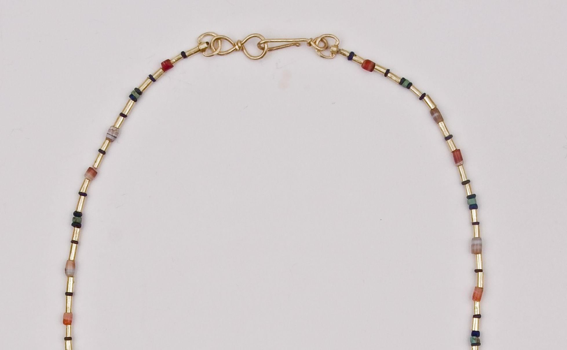 Ancient Lapis, Agate, Carnelian, and Turquoise Beads with 22k Gold and Pendant In Good Condition For Sale In Bloomington, IN