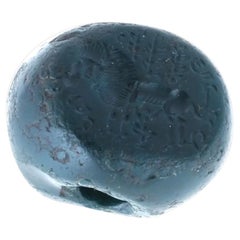 Ancienne grande perle de sang Sasanienne sculptée en taille-douce