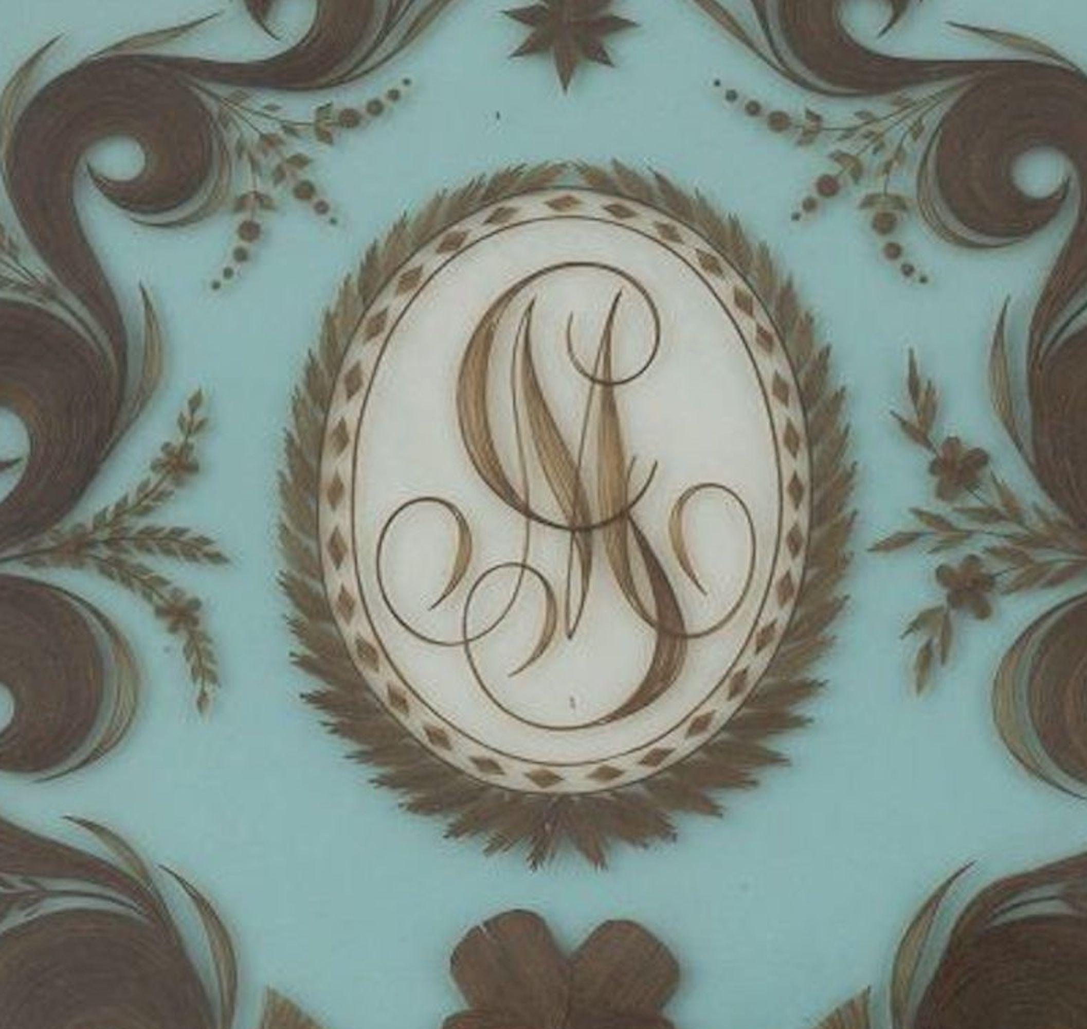 This is Manlio Garibaldi Monogram, a rare decorative object realized in Italy in 1874.

This important artwork represents the monogram MG of Manlio Garibaldi, the minor son of the famous general Giuseppe Garibaldi. Made with the young Manlio's