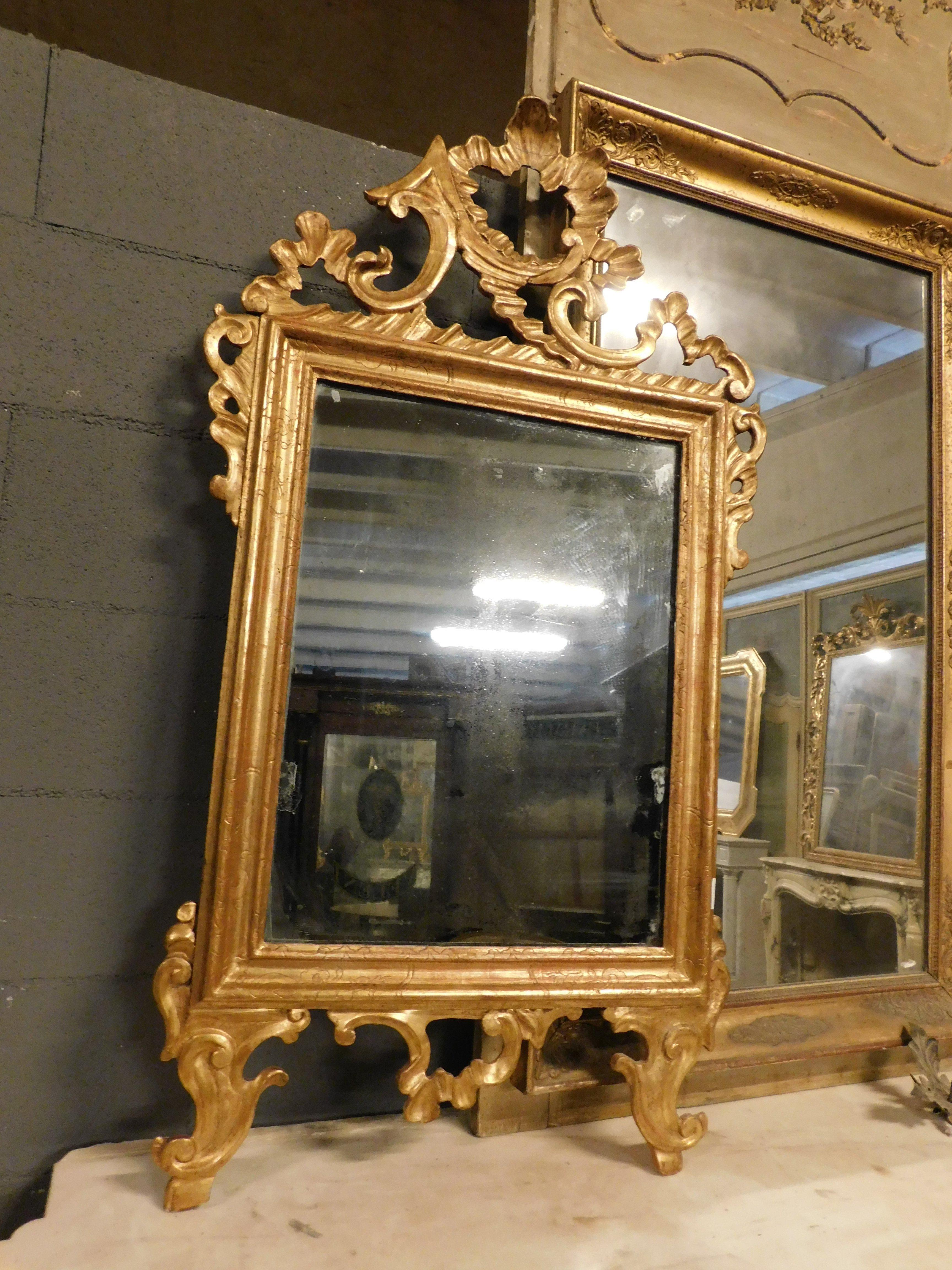 European Ancient mirror in gilded and carved wood, France