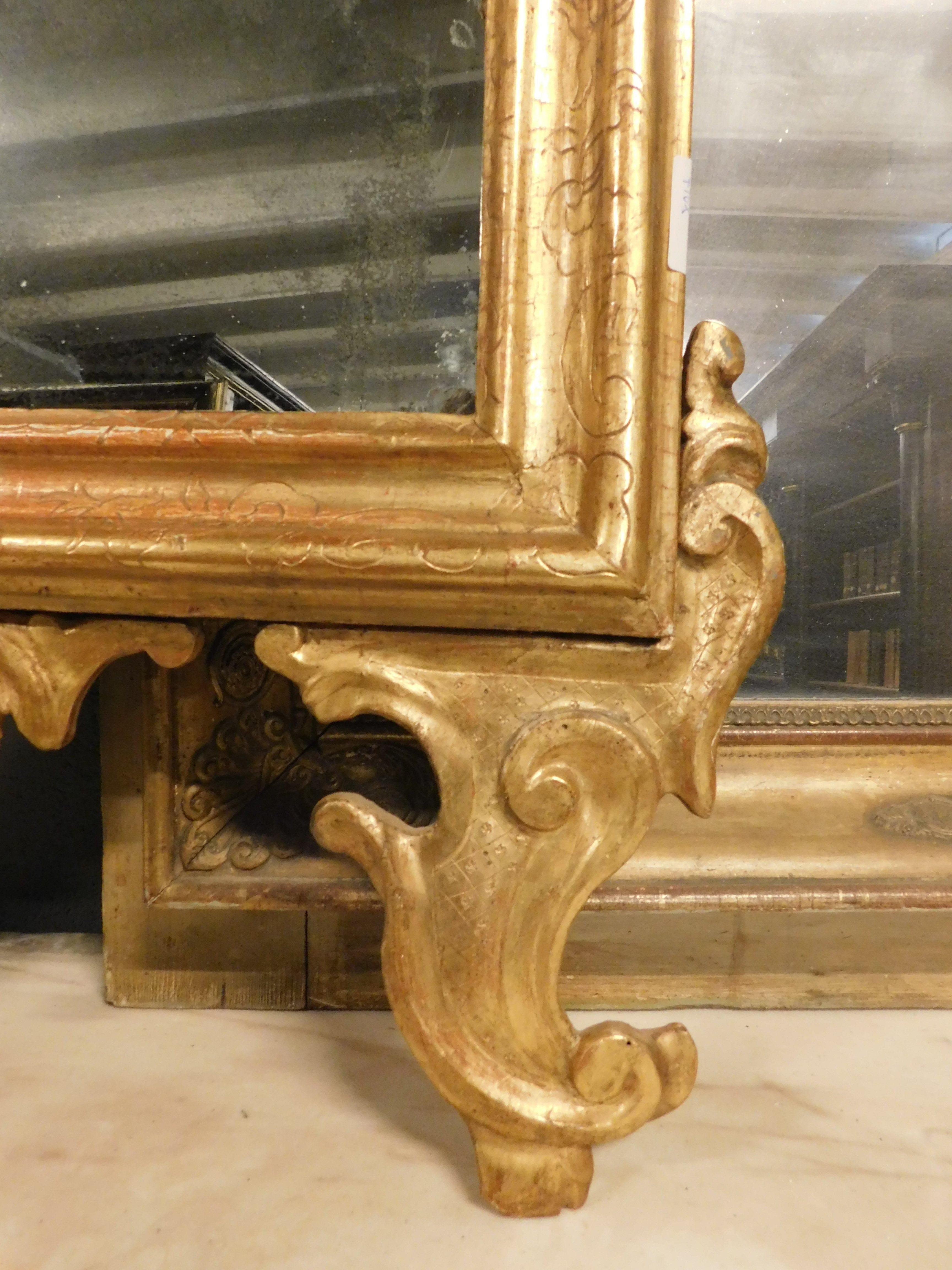 Carved Ancient mirror in gilded and carved wood, France