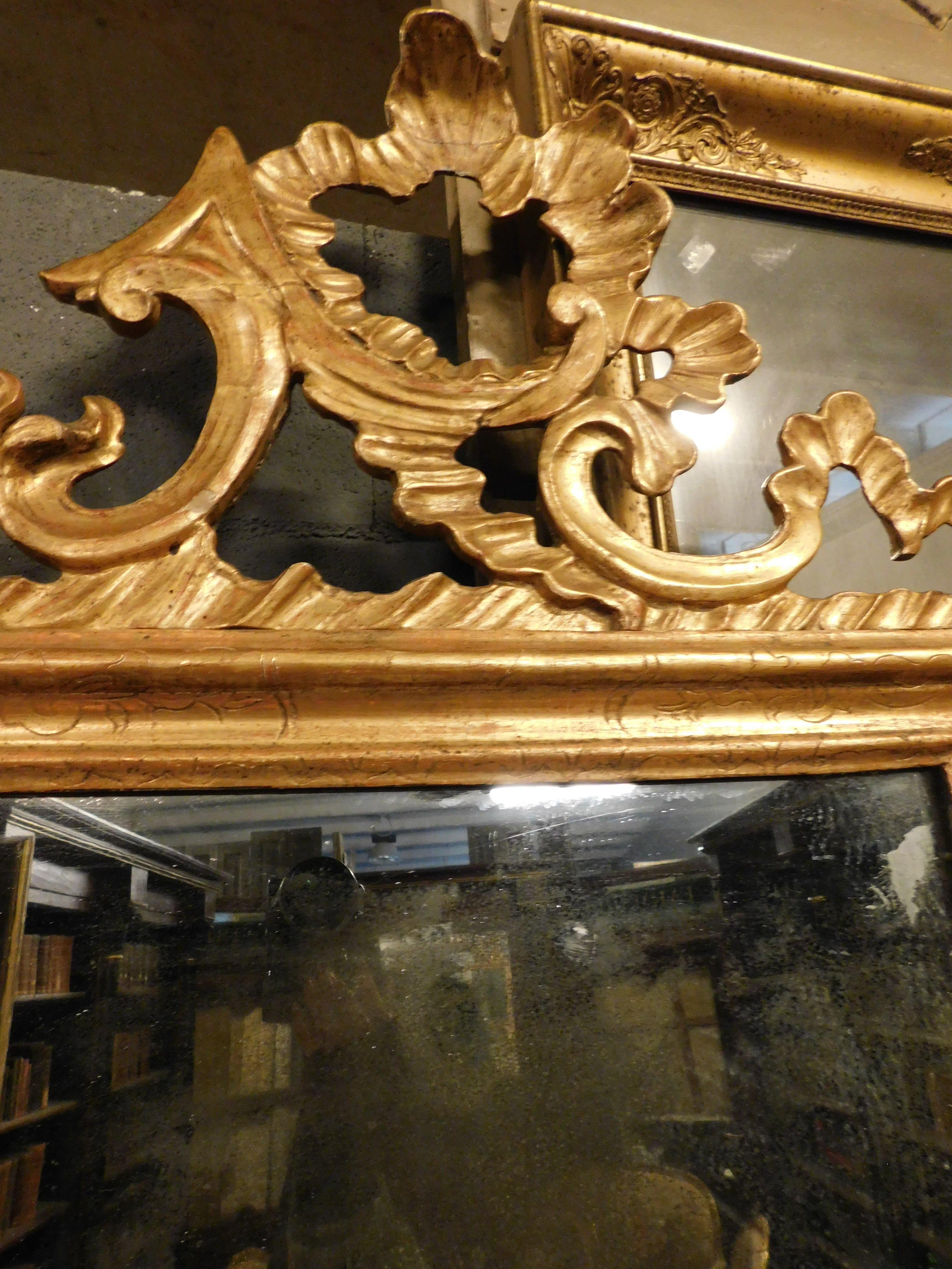 19th Century Ancient mirror in gilded and carved wood, France