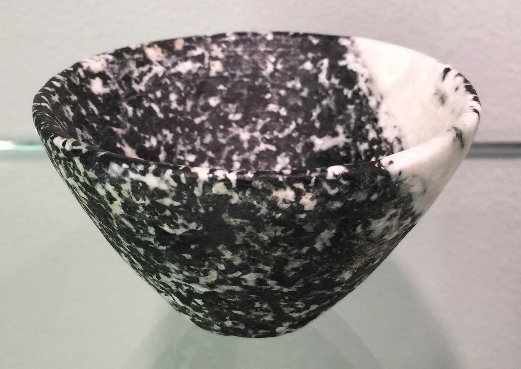 This Assyrian bichrome masterpiece dating 3rd millennium BC is a small bichrome stone vessel of extremely thin walled very dark green, almost black, and white speckled diorite. Fabulous preservation condition. Intact. A true museum quality