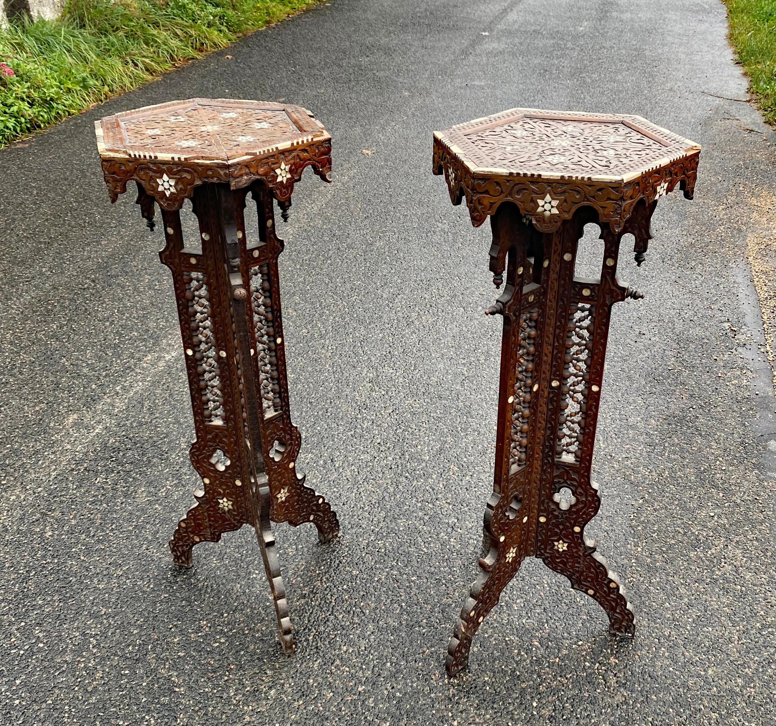 ancient oriental work, pair of carved wooden pedestals, bone and mother-of-pearl inlay
circa 1880
missing bones and mother-of-pearl