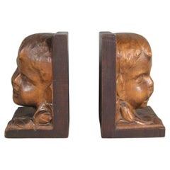 Ancient Pair of Bookends Decorated with Child Heads Jean Qui Rit - 1Y137