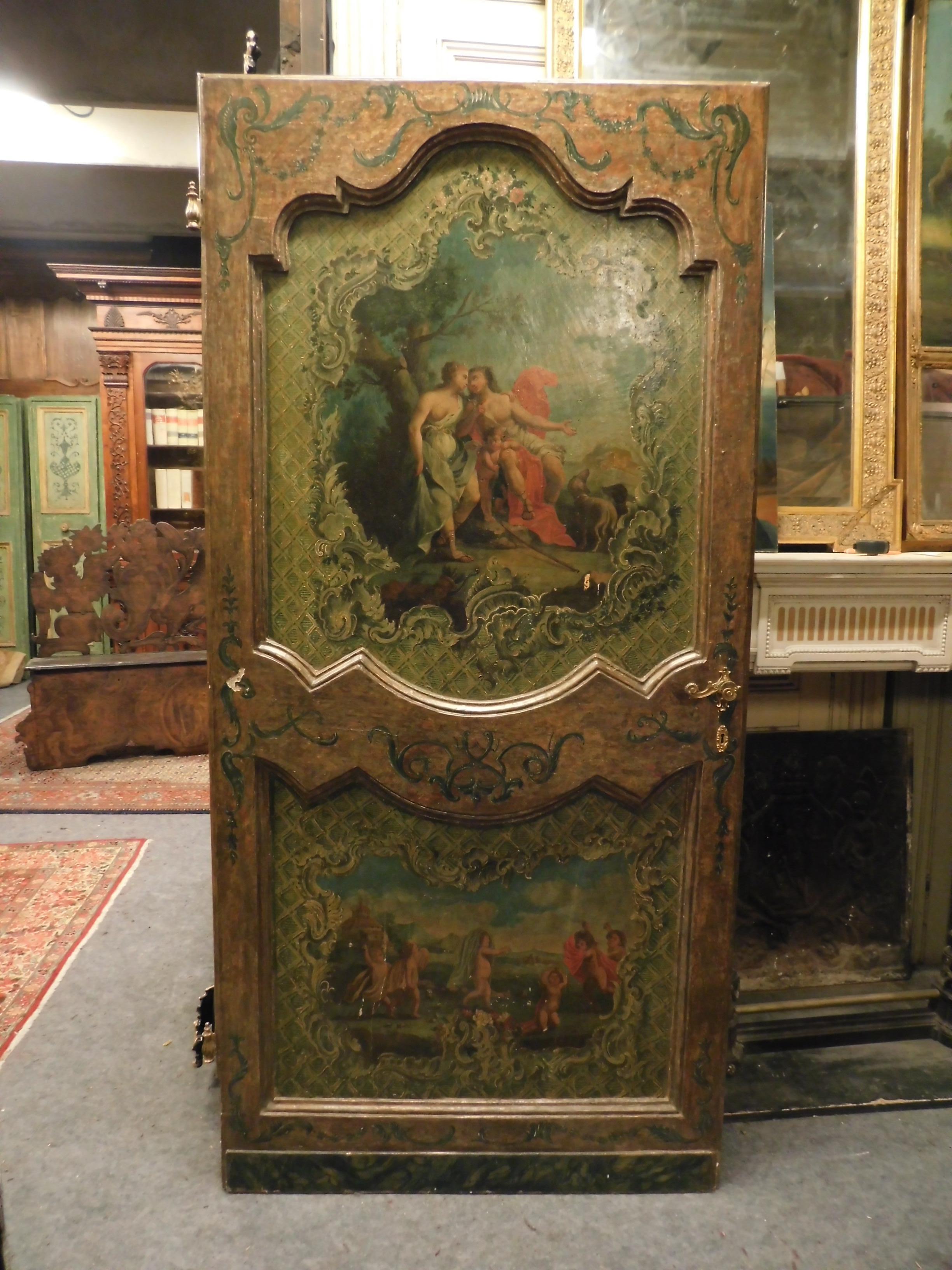 Very ancient pair of lacquered doors on a green background and hand painted in front and behind (orange background), represented various mythological and life scenes of the time, very moved and triccamente carved and decorated, made by a master