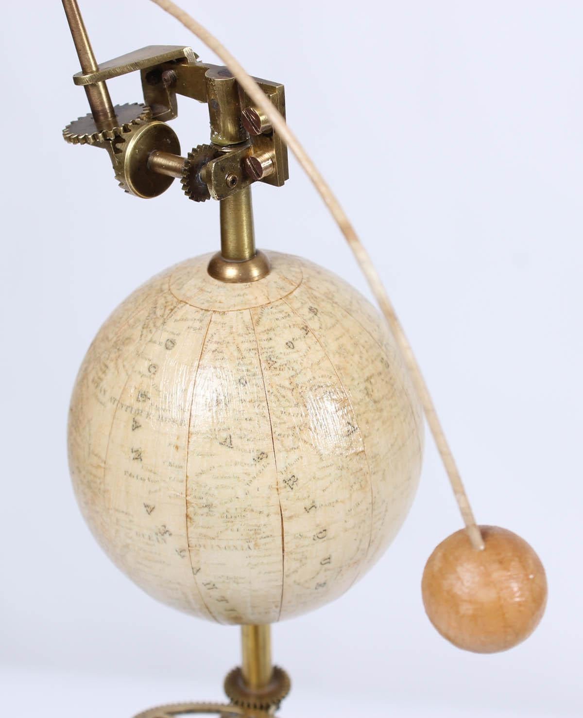 Ancient planetary model so-called Tellurium

Stockholm
metal, wood, paper
Historicism, circa 1900

Dimensions: Height ca 41 cm, length ca 60 cm

Illustrative scientific instrument with sun, earth and moon.

Description:
Above the rotation